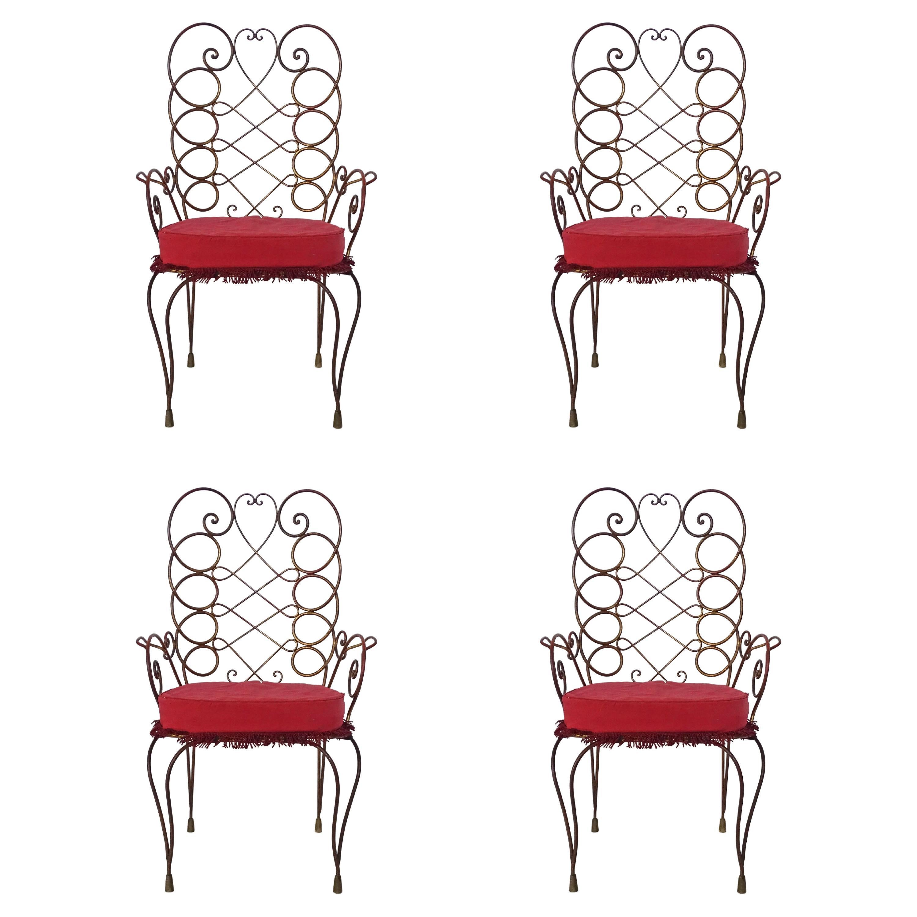 Gio Ponti conjunto de cuatro sillones de hierro pintado y dorado 1948