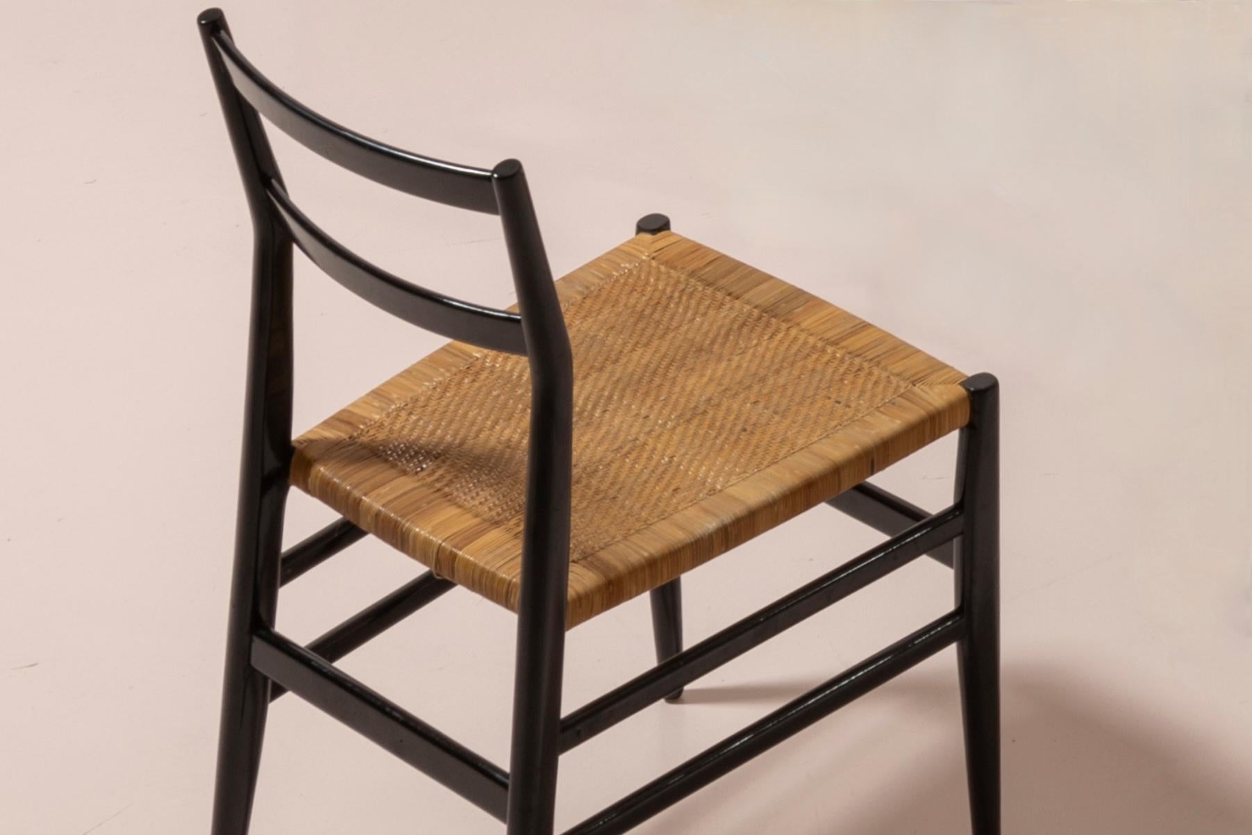 Mid-Century Modern Gio Ponti set of twelve Leggera chairs with hand-woven rattan cane, Italy 1951 For Sale