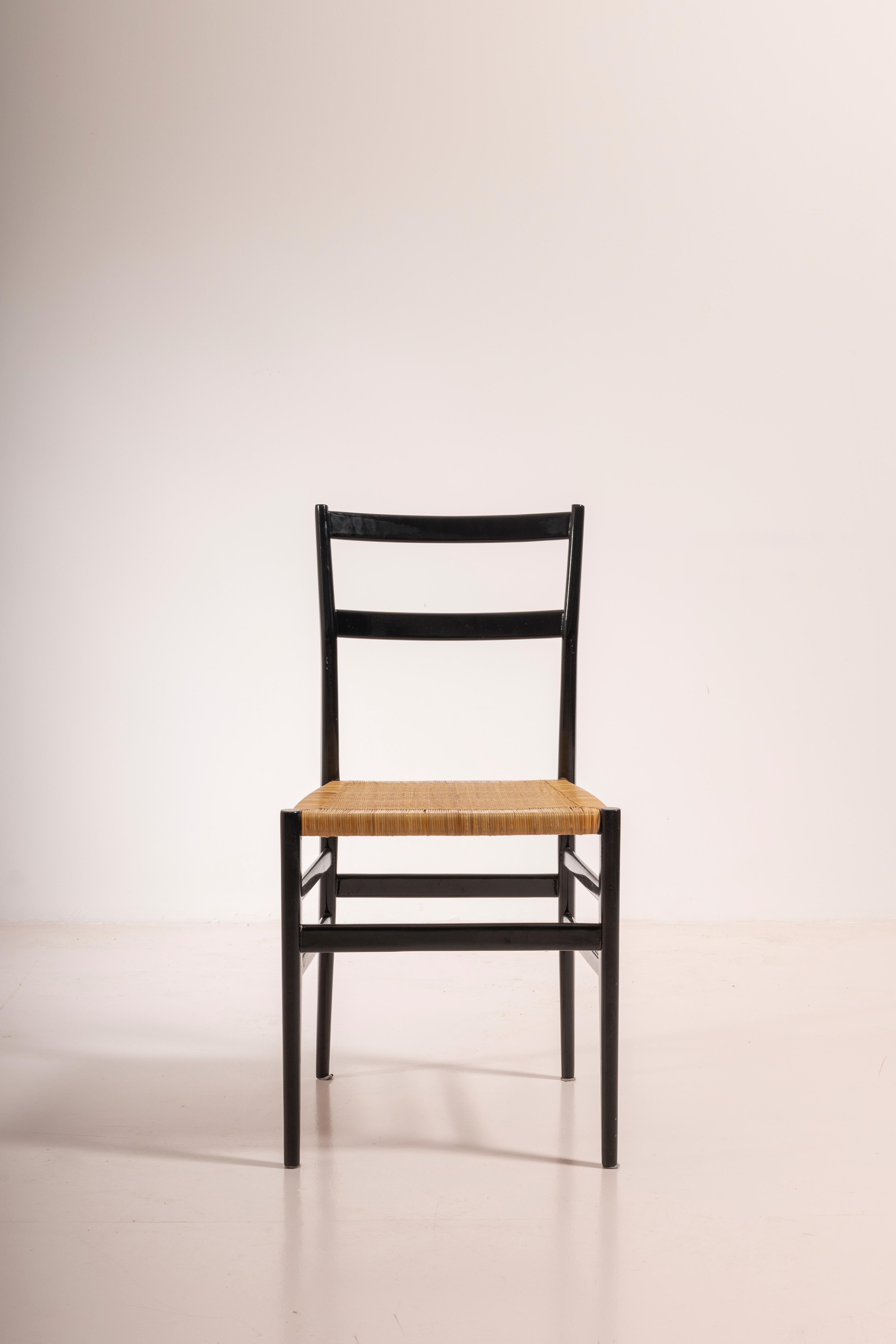 Cane Gio Ponti set of twelve Leggera chairs with hand-woven rattan cane, Italy 1951 For Sale