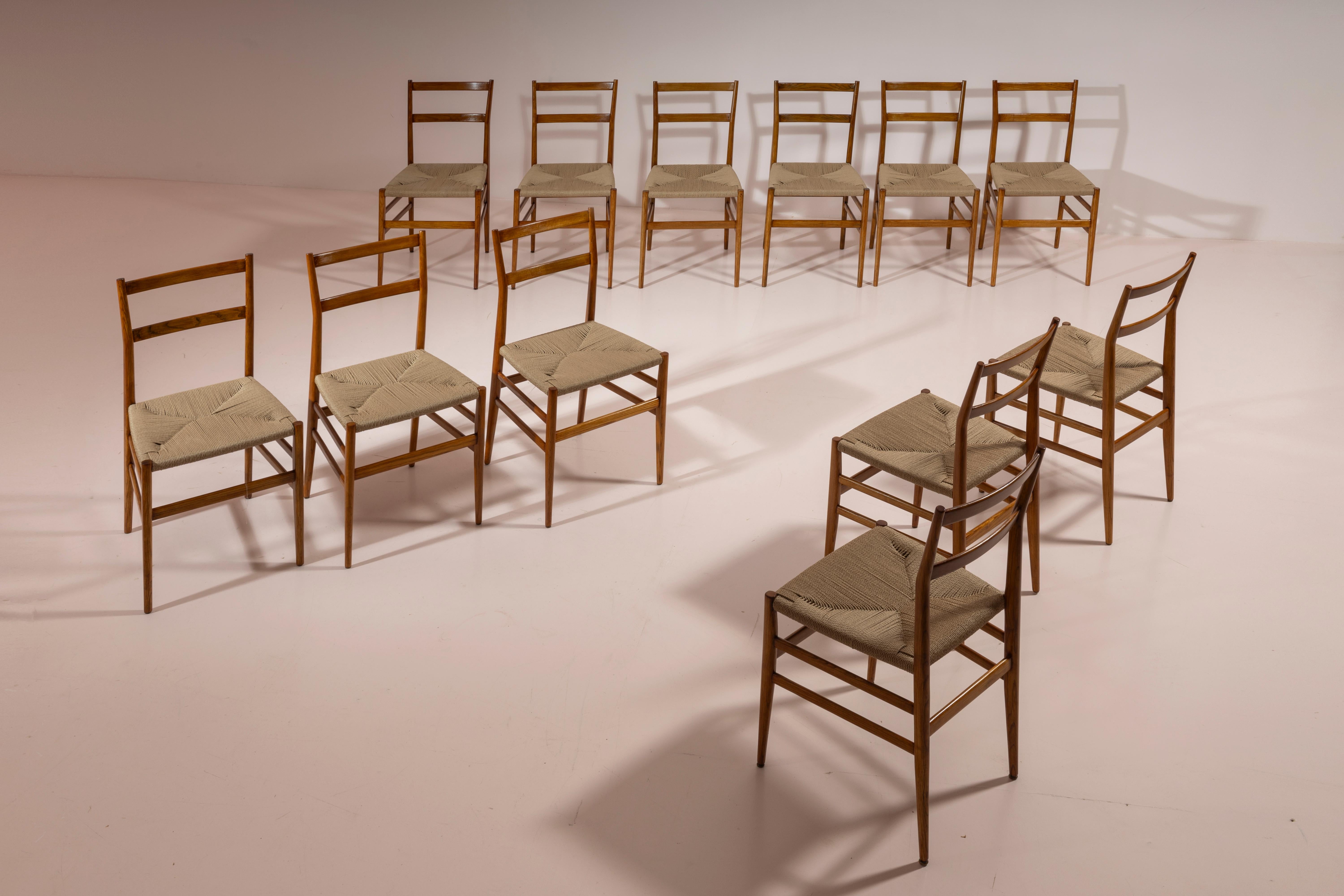 Set of 12 ash wood chairs with hand-knotted rope seats, designed by Gio Ponti as model 646 Leggera in 1951 and manufactured by Figli di Amedeo Cassina during the late 1950s.

Conceptualized by Gio Ponti in 1951, this chair is instantly recognizable