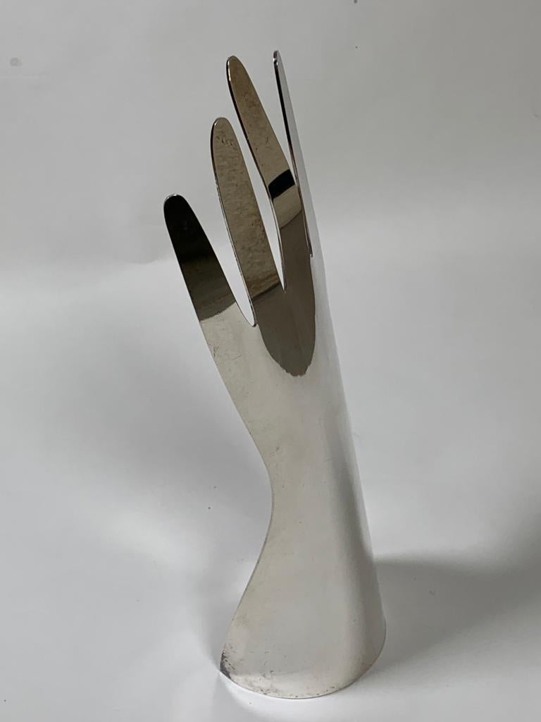metal hand sculpture