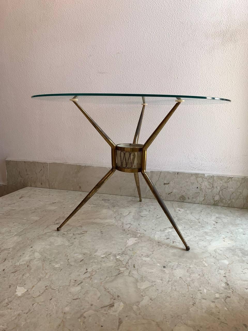 Very rare 1930s Italian tripod coffee table in Gio Ponti style, gilt brass, crystal top.