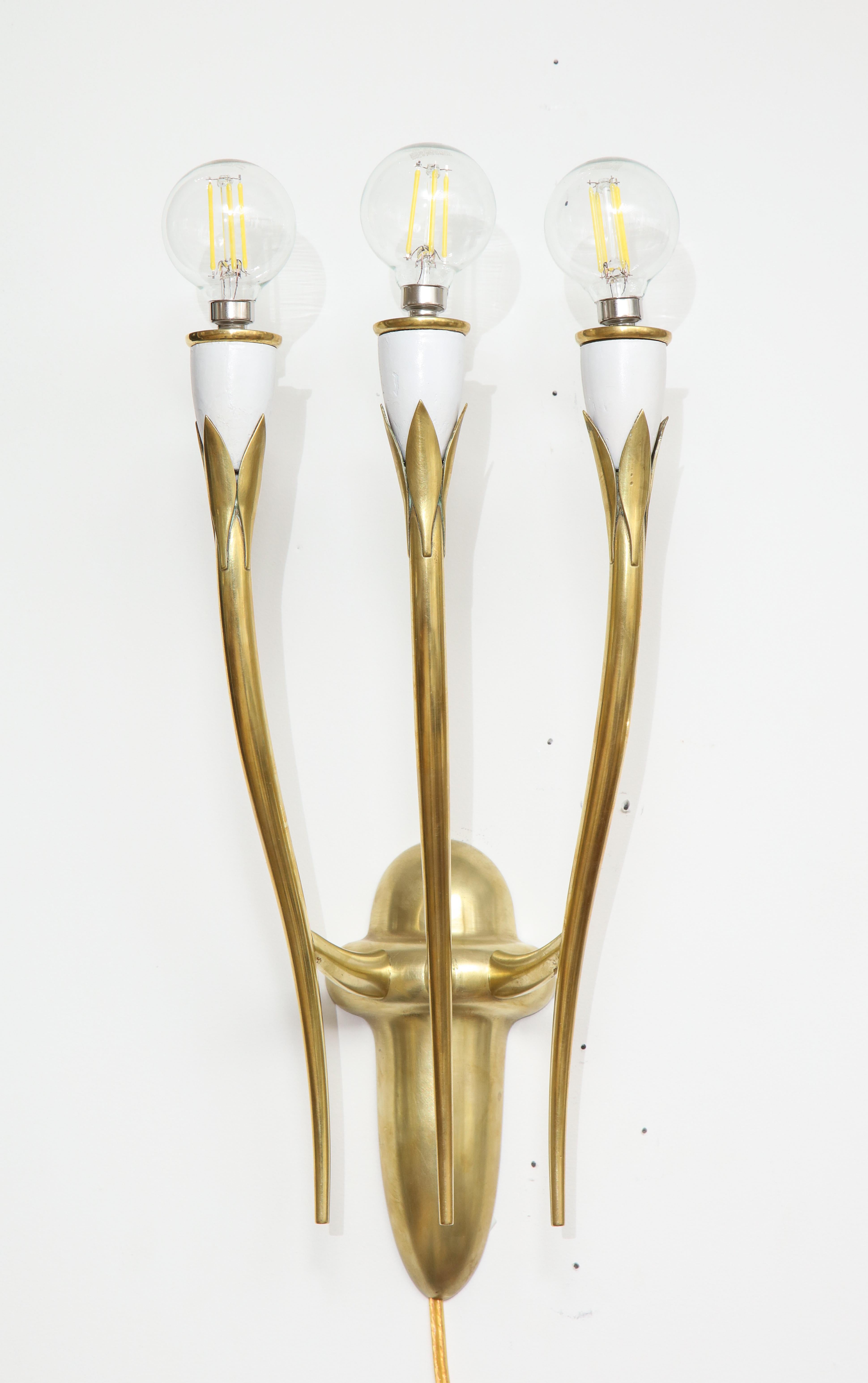 1950s solid brass Italian brass sconces in the style of Gio Ponti. Newly rewired and ready to use.