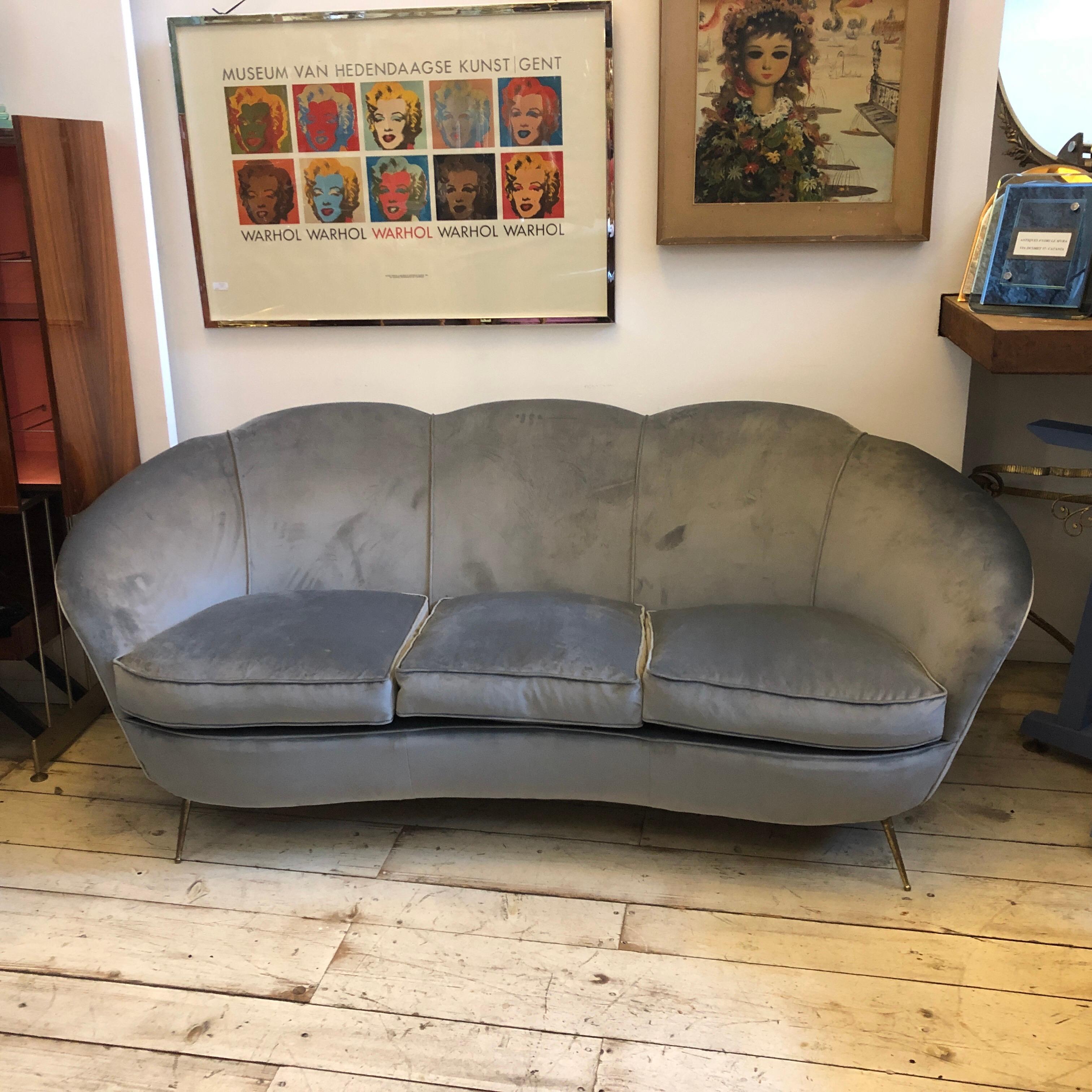 Stylish Mid-Century Modern gray velvet and brass Italian curved sofa in the manner of Gio Ponti. Brass is in original patina, grey velvet has been upholstered and never used.