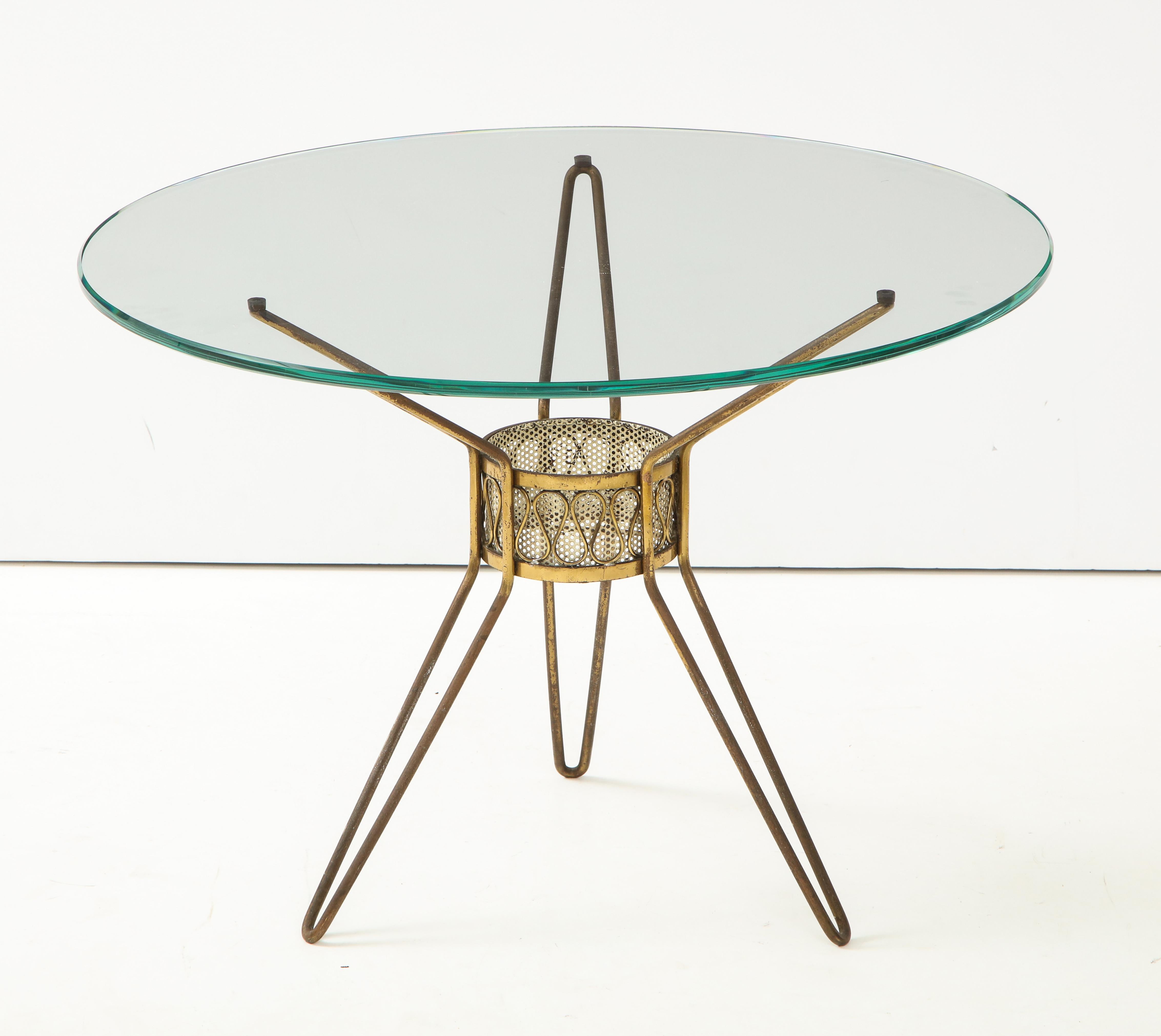 Gio Ponti style occasional tripod table, of the period, Italy, circa 1950s
Small occasion table, Italy, circa 1940s-1950s
Cut crystal top, brass, mesh, white enamel
Measures: Height 20.5, diameter 28 in.