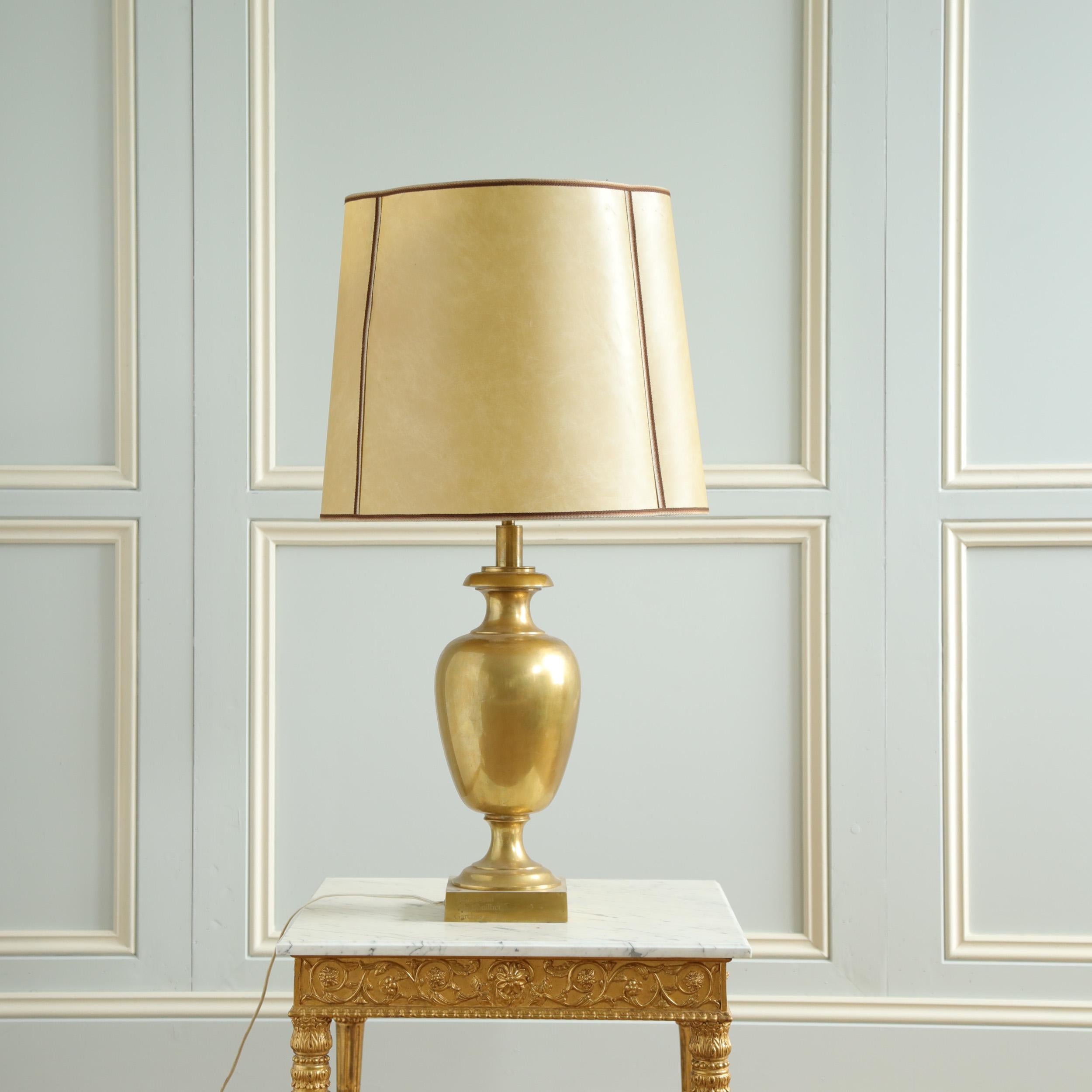 A stylish Brass Lamp with Parchment Shade