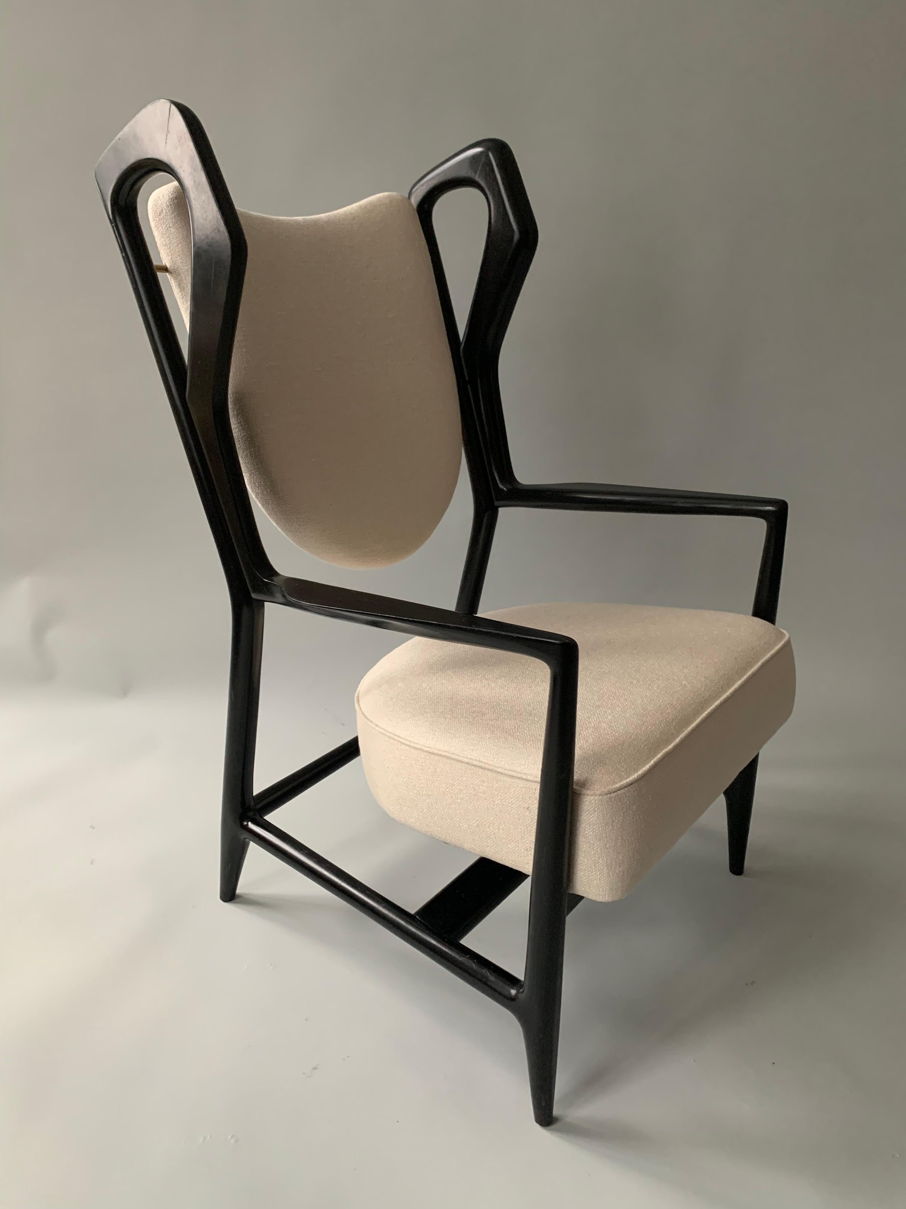
Item: ‘Triennale’ armchairs

Designer: Gio Ponti 

Manufacturer: I.S.A. Bergamo

Demensions: 41 7/8” h x 24 1/4” w x 28 7/8” d

Material: ebonized walnut, brass and fabric

Date made: 1951

Country of origin: Italy

Literature:
Domus, no. 280 March