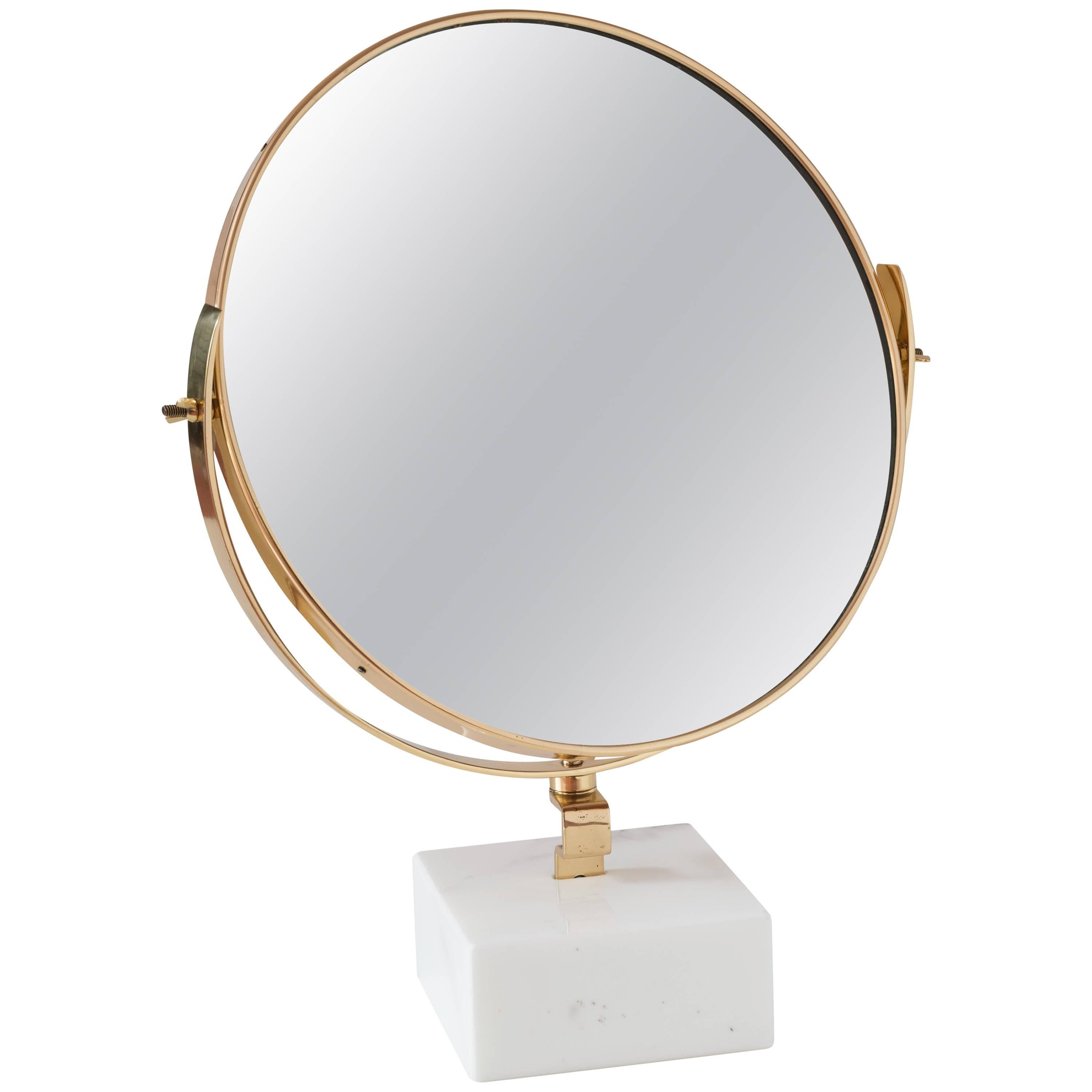 Vanity mirror designed by Gio Ponti for the vanity of Hotel Royal, Napoli, 1955 and produced by Fontana Arte in 1955. 
limited editon
Original piece customized by CG with marble support in 2016. 
The Gio Ponti vanity was produced by Giordano