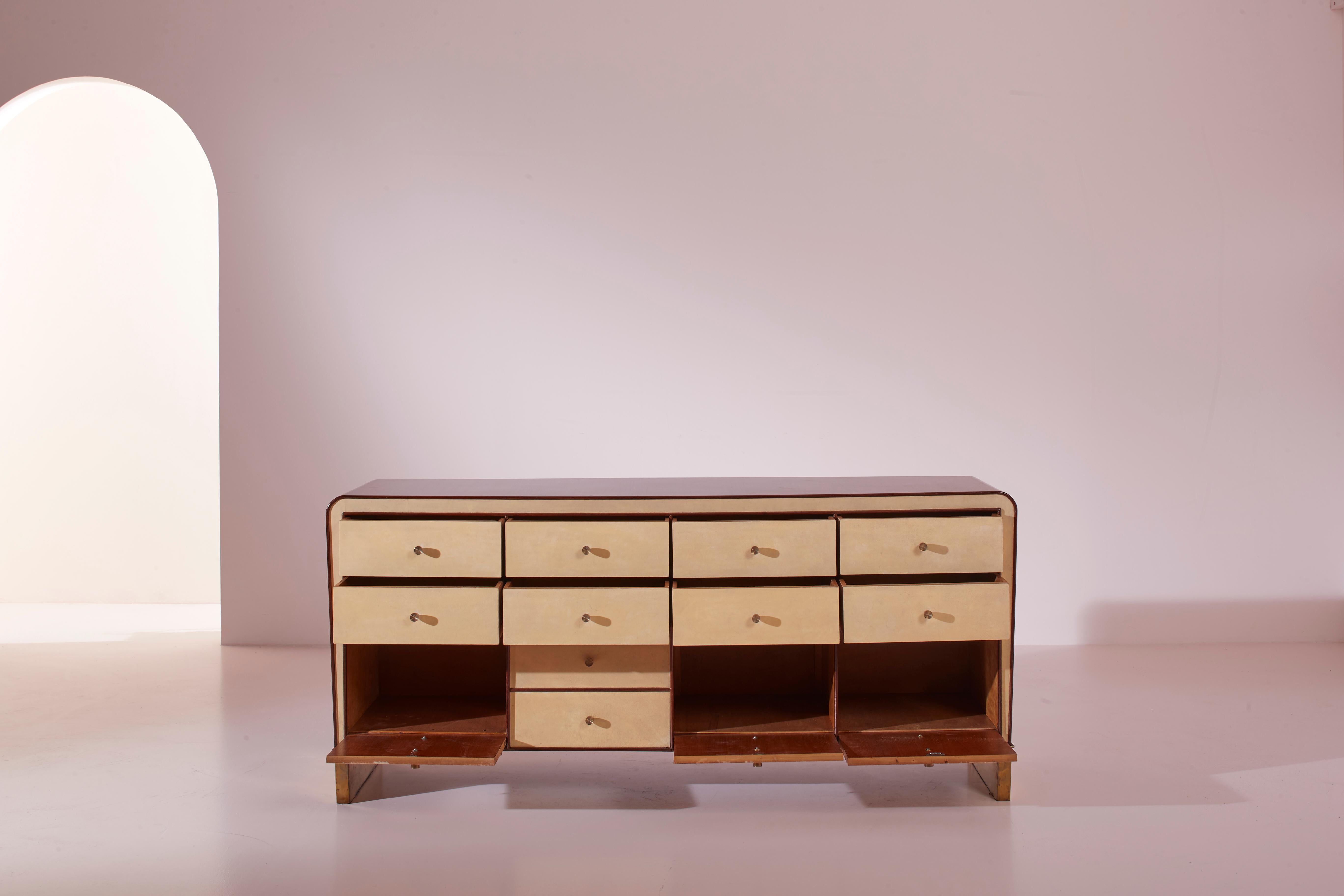 Italian Gio Ponti walnut, parchment and brass chest of drawers, Italy, 1930s