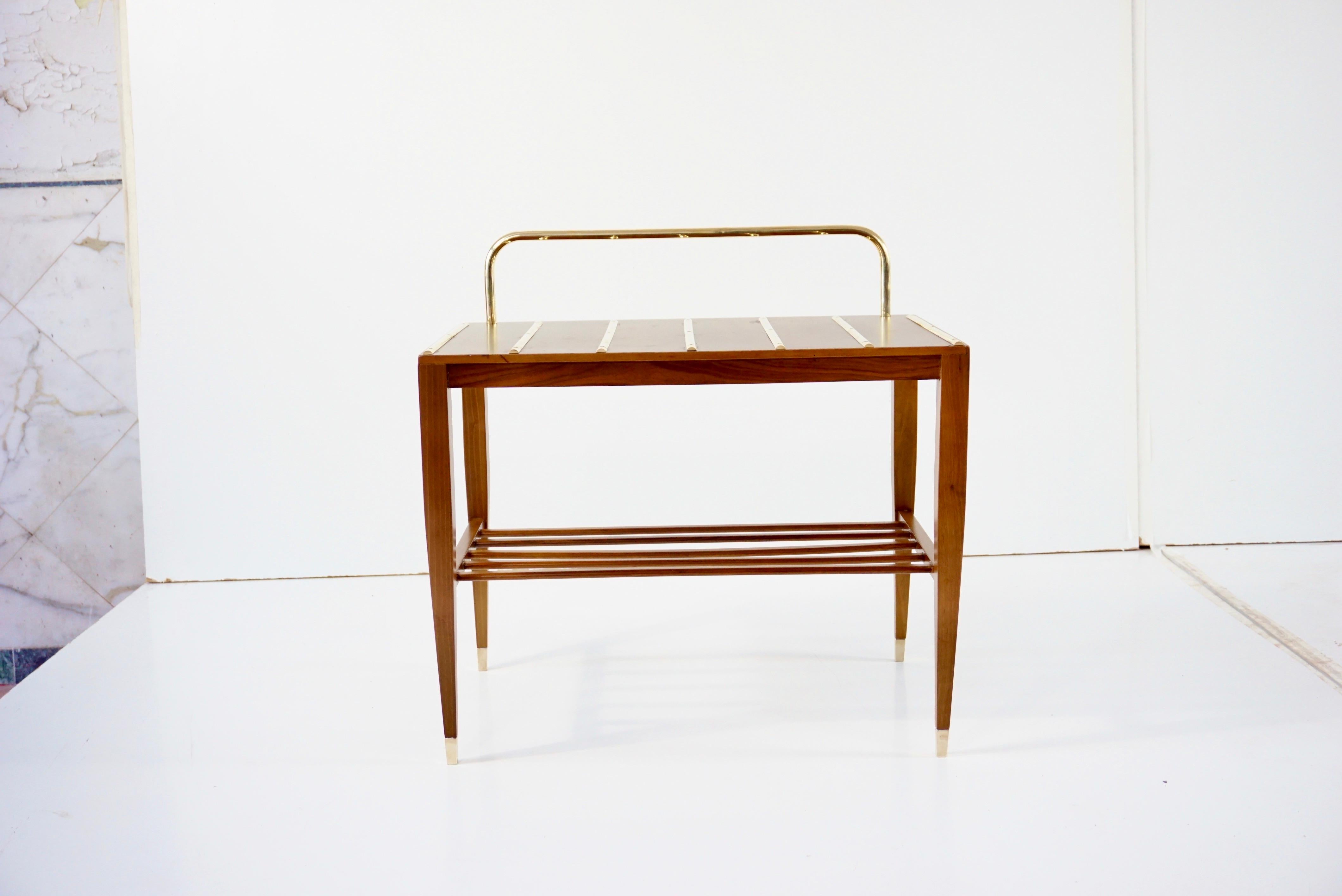 Gio Ponti side table (stand) produced by Giordano Chiesa, from the suite of the Hotel Royal Naples, 1955
Italian walnut, brass. Brass details: Handles, foot and seven sections 
five walnut sticks
Measures: Height 64 cm, 65 x 42 cm; height without