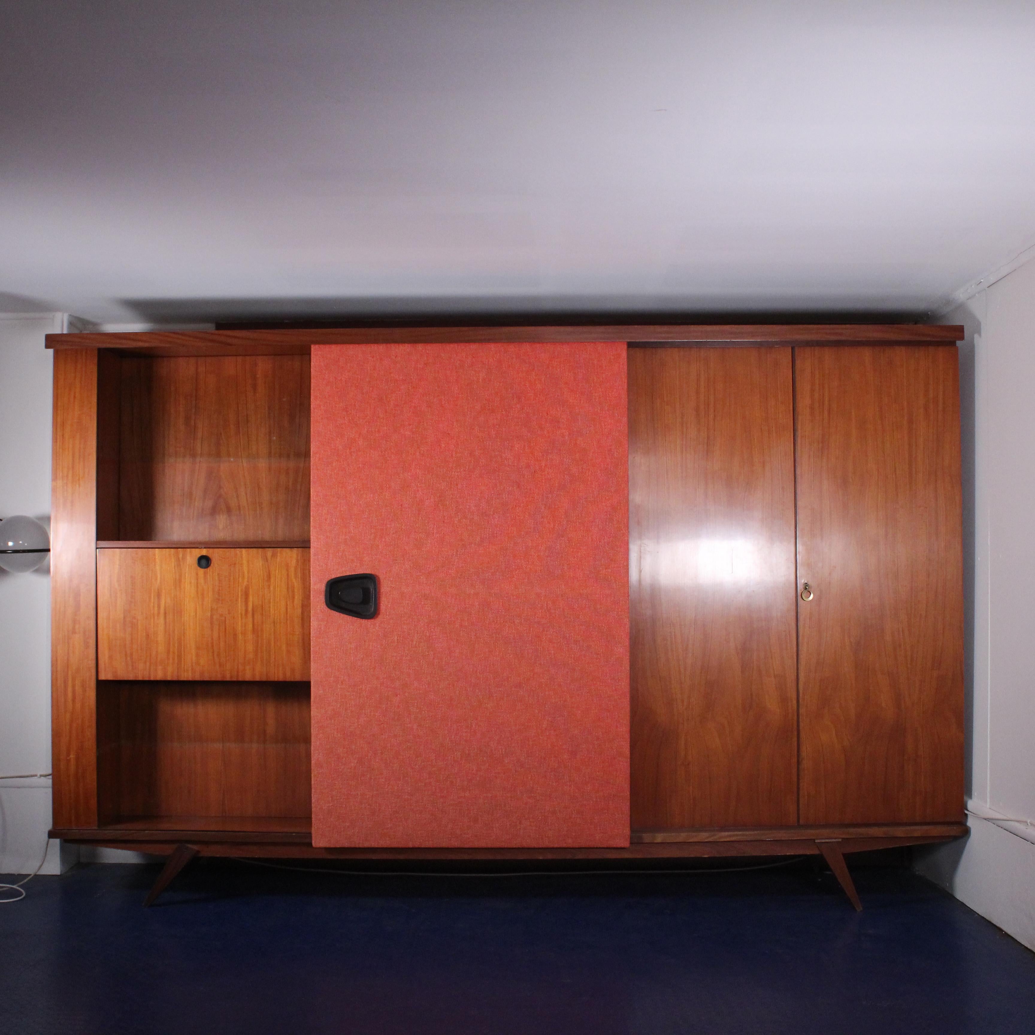 The Gio Ponti Wardrobe from the 1960s epitomizes mid-century modern sophistication and functional artistry. Crafted under the visionary eye of Italian architect and designer Gio Ponti, this iconic piece seamlessly blends form and function. The
