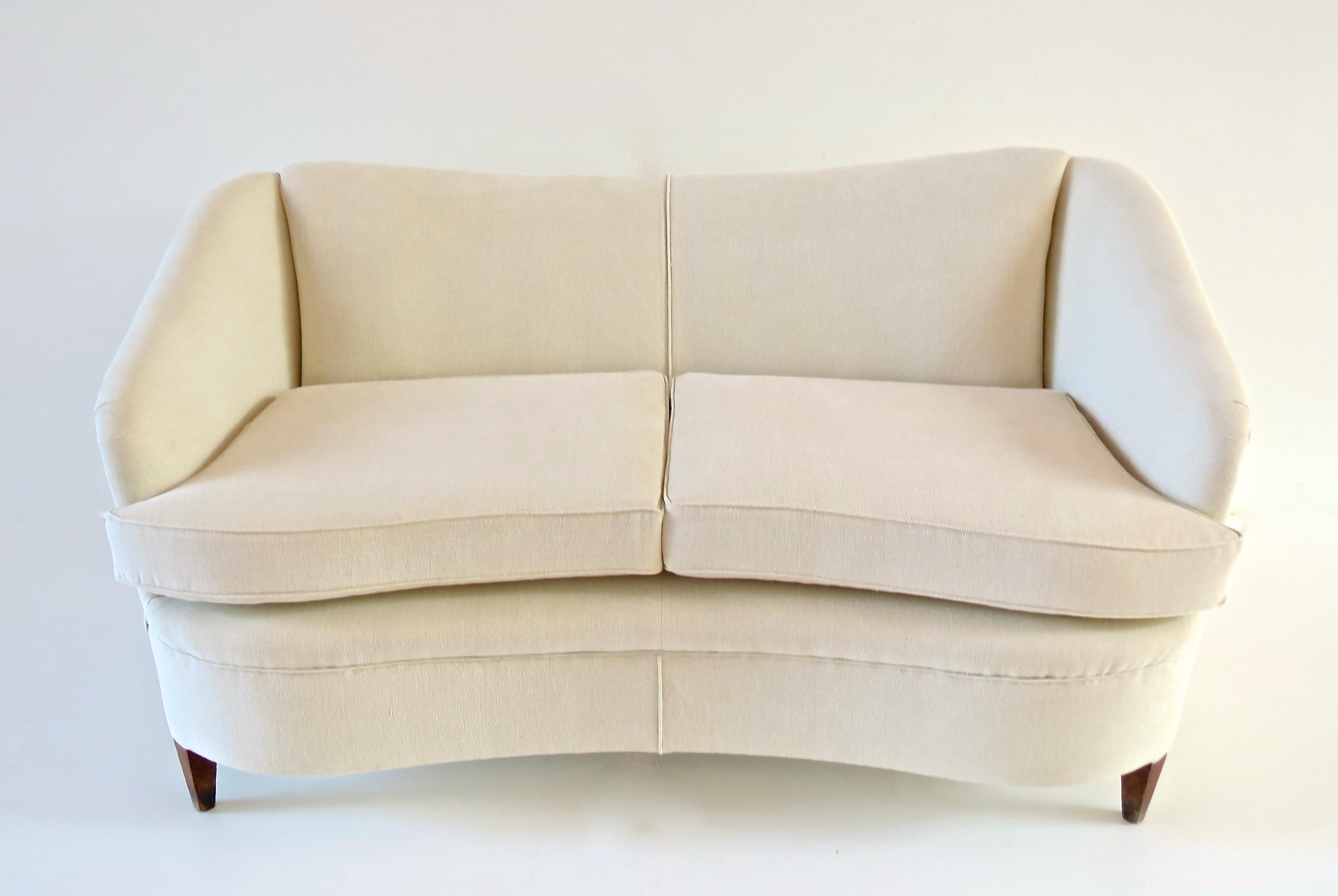 A Gio Ponti Casa & Giardino white sofa, circa 1938
walnut and fabric; white cotton and walnut feet
fully rest orated and newly upholstered
Measure: height 79, cm 152 x 82cm, high seat 46 cm
very good condition
available with this item a Gio