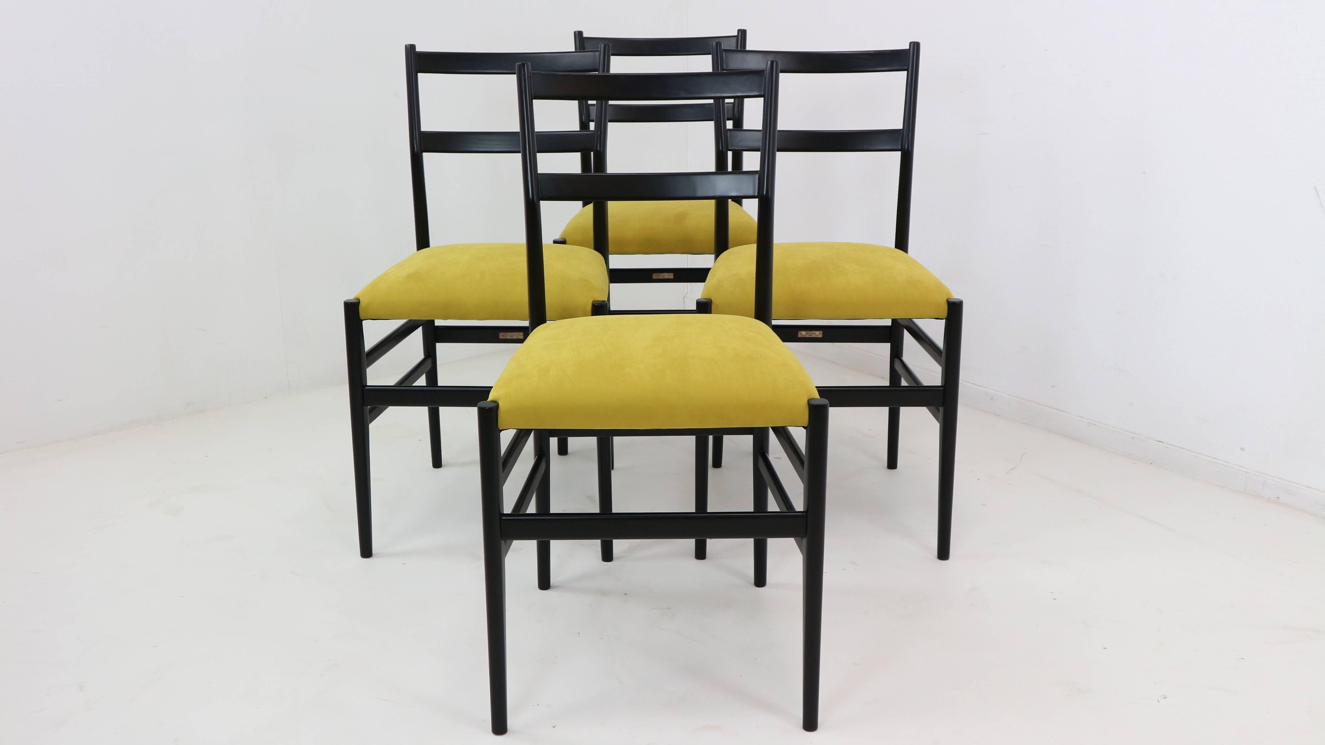 This set of four Leggera chairs was designed by Gio Ponti in 1951. They were manufactured by Cassina in 1952. After few years, in 1957, Ponti tweaked the design and released the iconic Superleggera model. This version is made from black lacquered