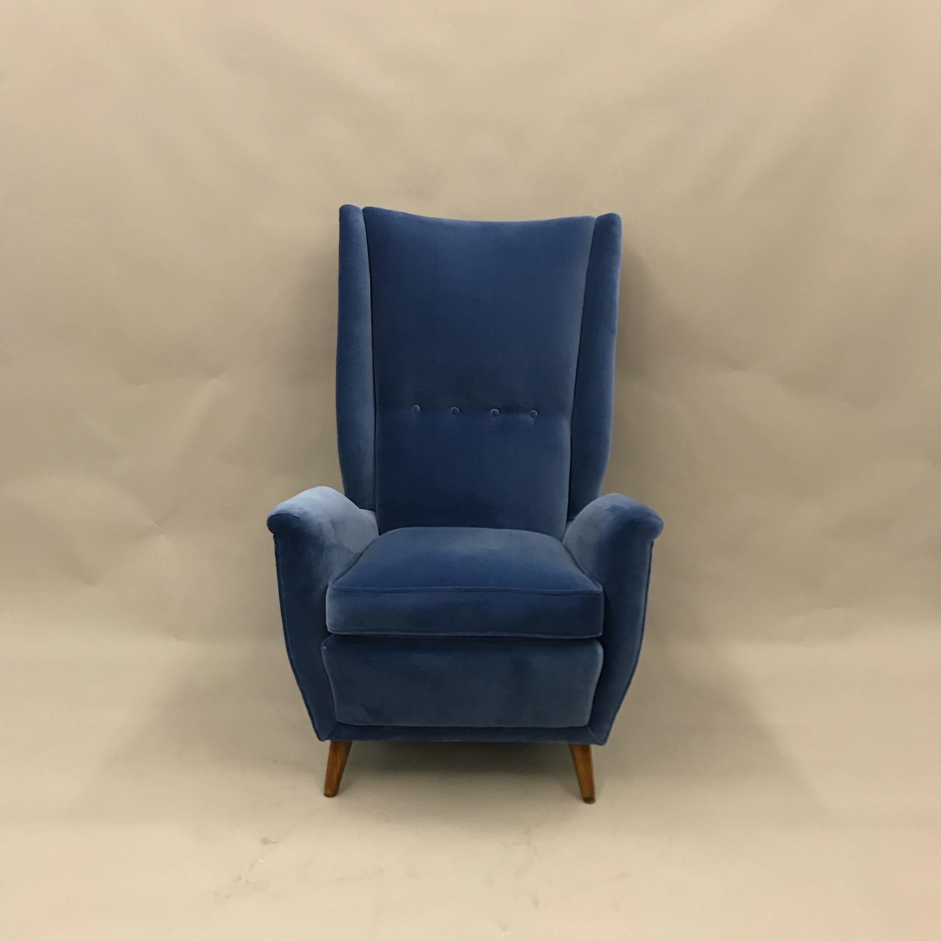 Gorgeous Gio Ponti armchair by ISA Bergamo completely reupholstery inside/outside in professional way with Designers Guild Varese cotton velvet, feet in walnut wood this model is particularly comfortable by the high back and design.
This model was