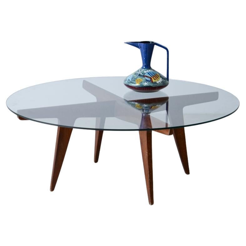 Gio Ponti's rare four crossed wooden spokes coffee table For Sale