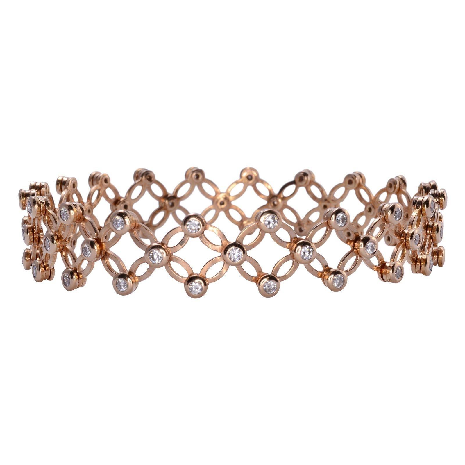 Estate Italian SI.RO Gioelli 18K rose gold diamond convertible ring or bracelet. This 18 karat rose gold ring converts to a bracelet. The flex ring bracelet features 60 diamonds at 1.32 carat total weight. The diamonds are VS1 clarity and G-H color.