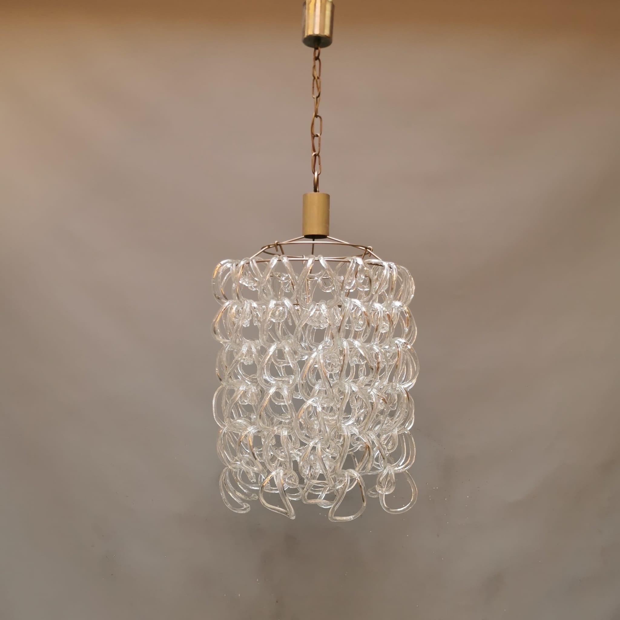Giogali is a decorative lighting system based on the element of the modular crystal hook, where each hook has been hand-curved by master glassmakers in Murano, this sophisticated work was designed by Angelo Mangiarotti. His design work tends to