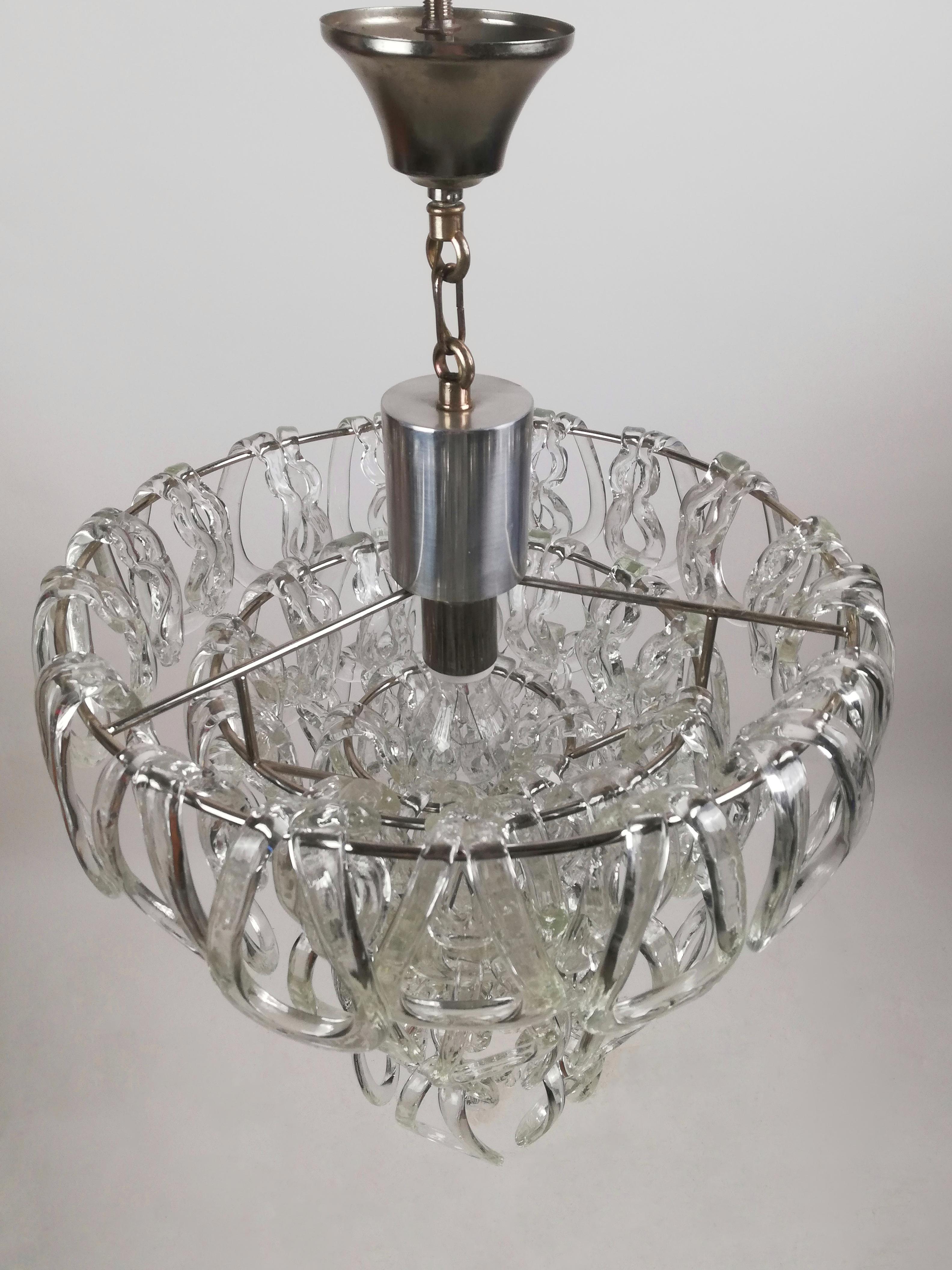 An original midcentury crystal chandelier of the series 
