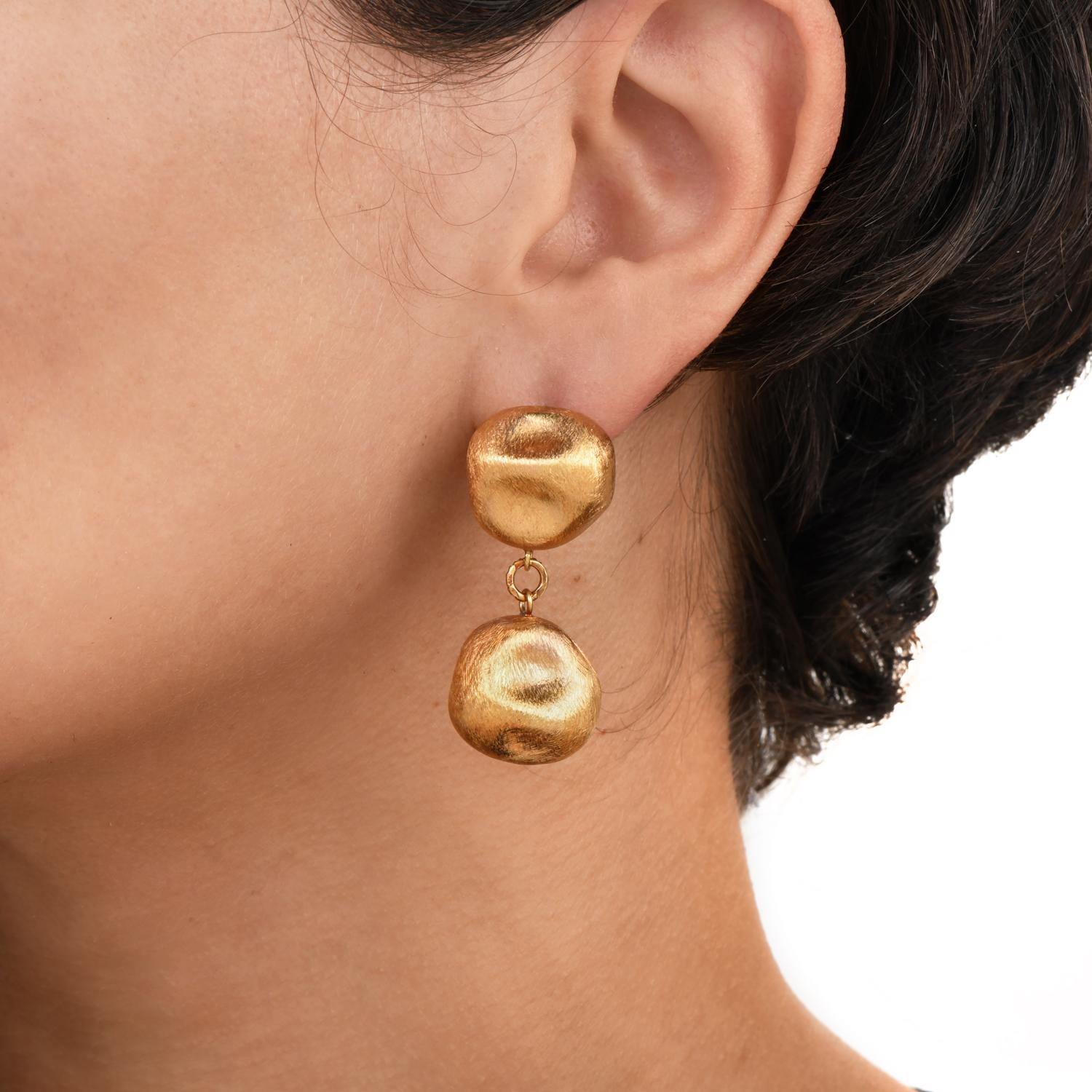 A stylish pair of Beaded Gold earrings! 

These modern Giordana Castellan ball-dangle drop earrings are perfect for everyday wear. 

Crafted in 14K Yellow Gold, each earring has a gold Ball, with a satin finish. Measuring 17 mm approximately. 

The