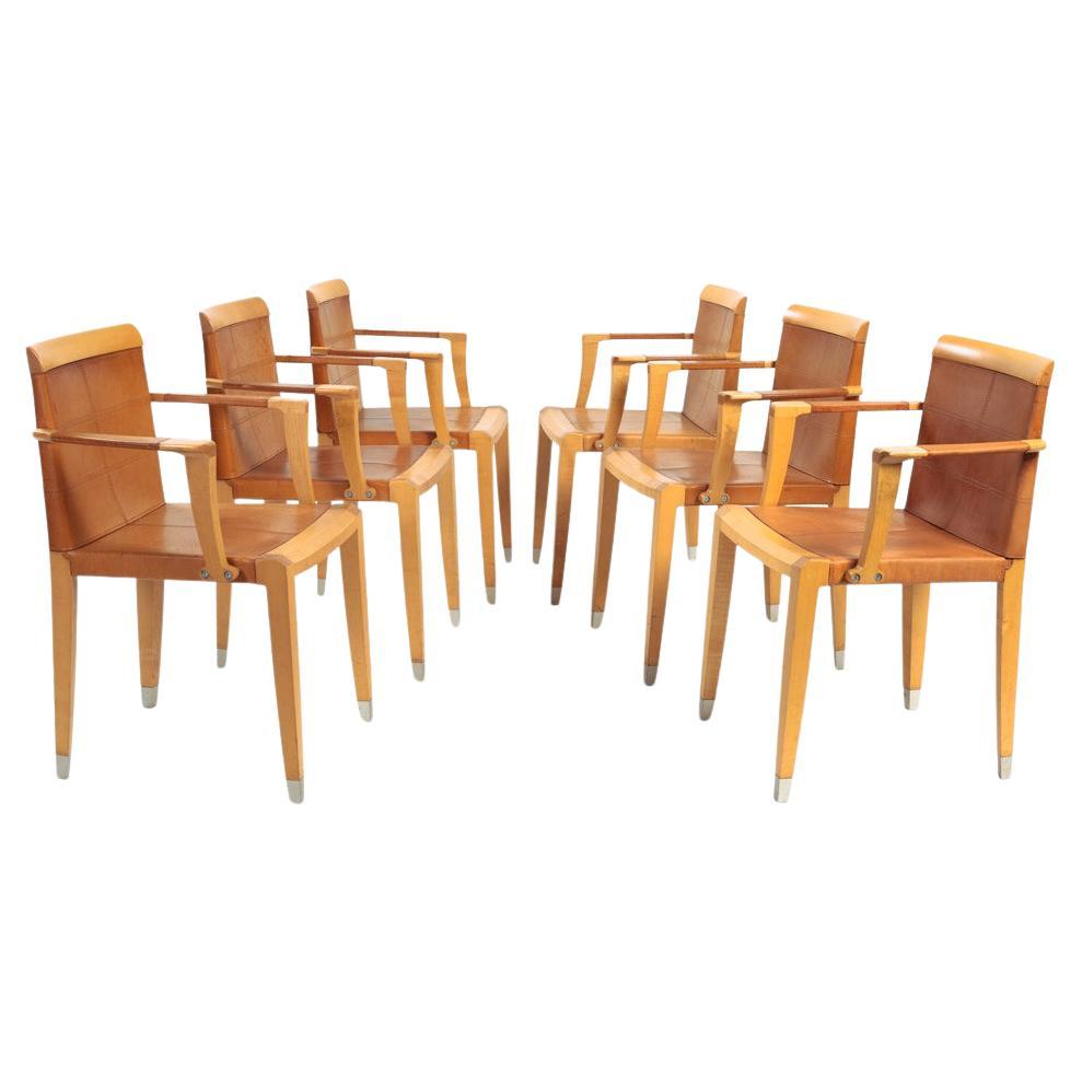 Giorgetti Italian leather Aro dining chairs by Chi Wing Lo