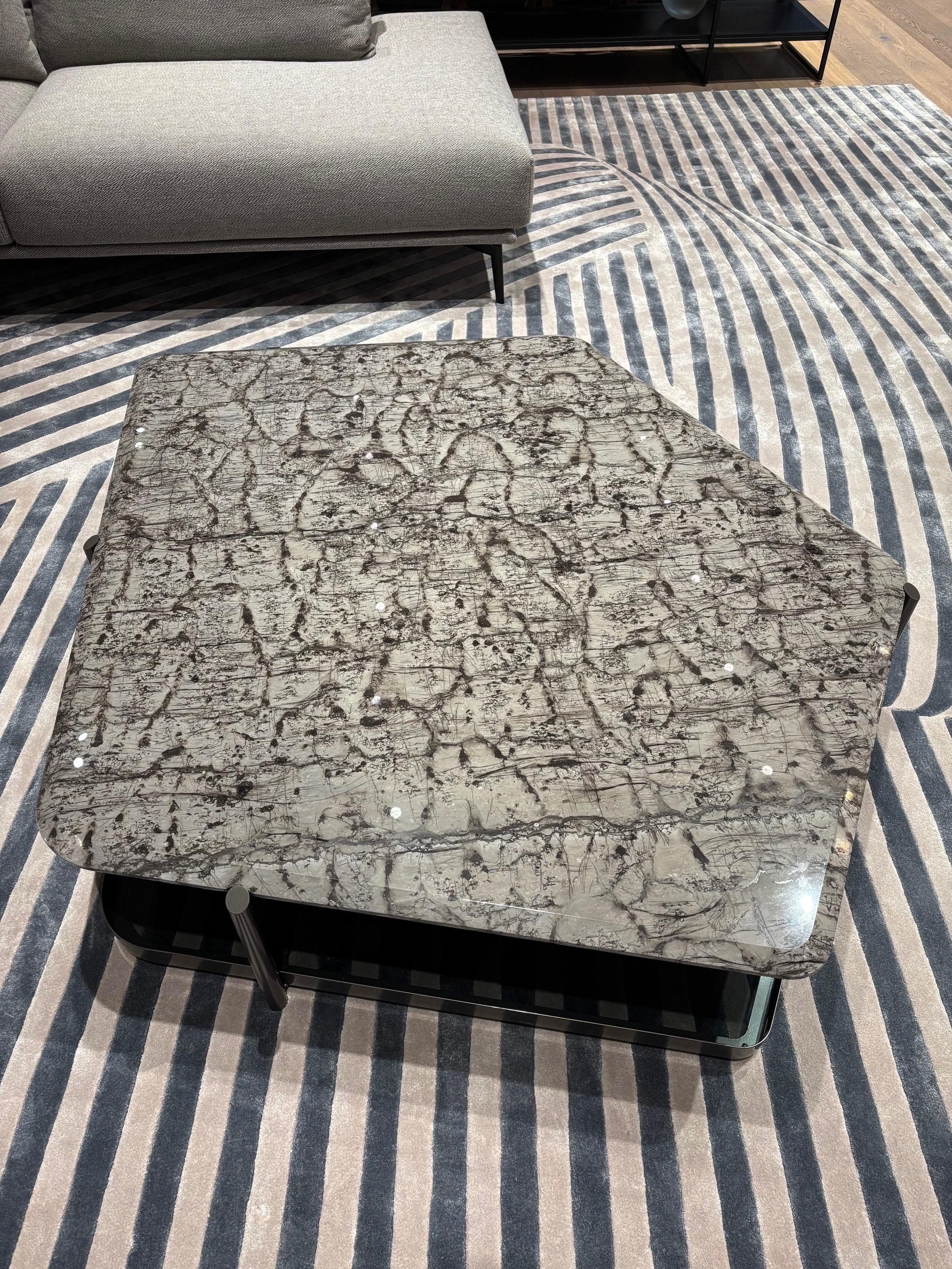 Pentagonal low table in metal pewter finished, with top available in different materials.