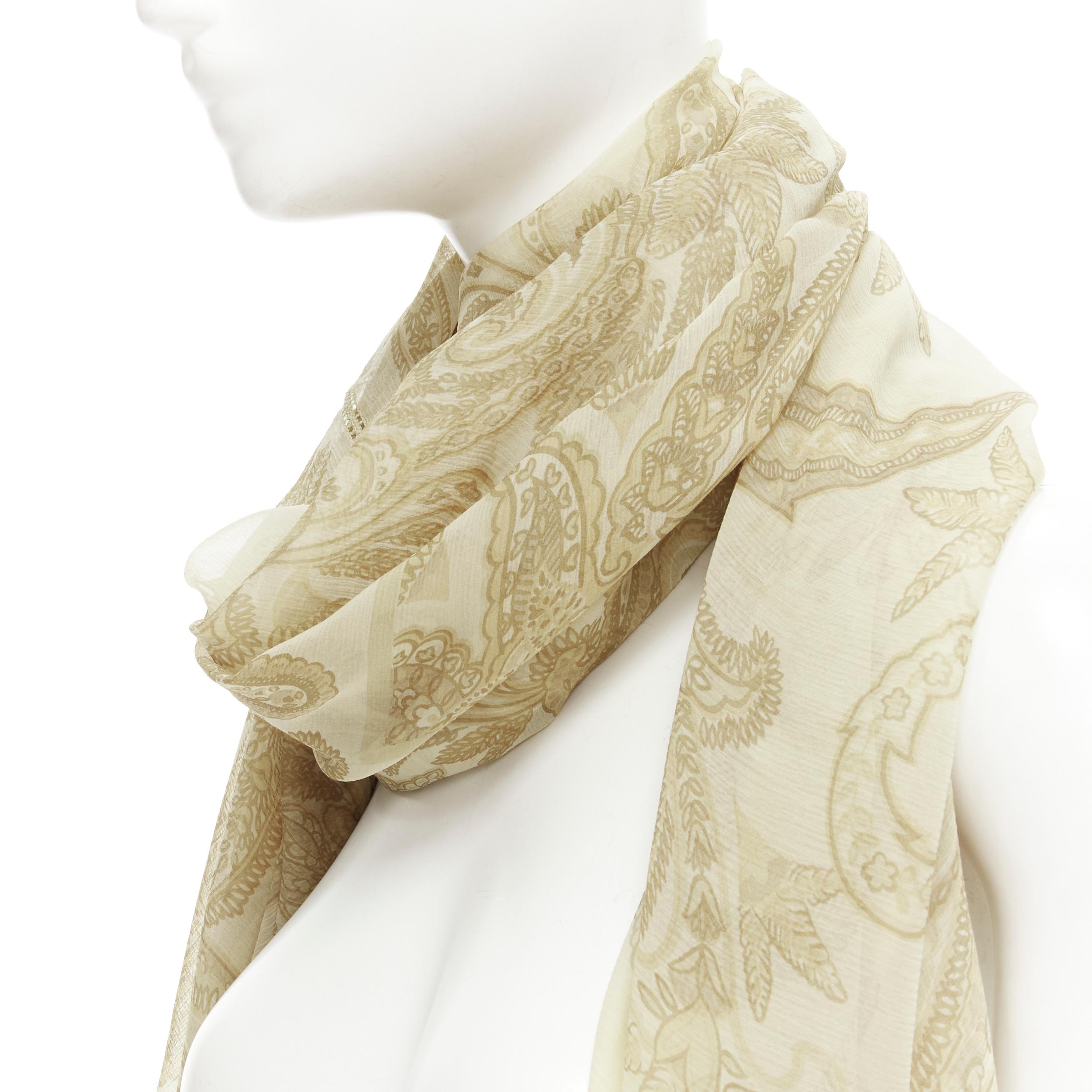 GIORGIO ARMANI 100% silk beige floral print sheer scarf 
Reference: AEMA/A00088 
Brand: Giorgio Armani 
Material: Silk 
Color: Beige 
Pattern: Floral 
Extra Detail: Ladder seam along edge. 
Made in: Italy 

CONDITION: 
Condition: Excellent, this