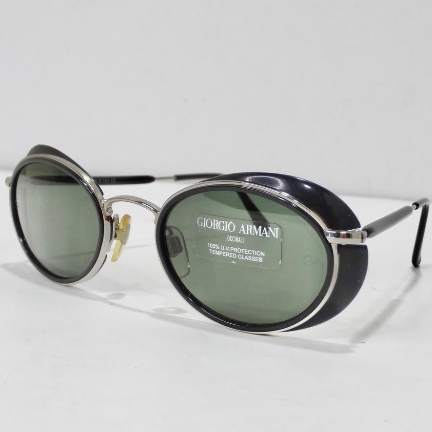 Elevate your eyewear this summer with these beautiful Giorgio Armani dead stock sunglasses circa 1990s! The most elegant sunglasses featuring blue/green tone lenses accompanied by black and silver tone detailing. These are so timeless and wearable!