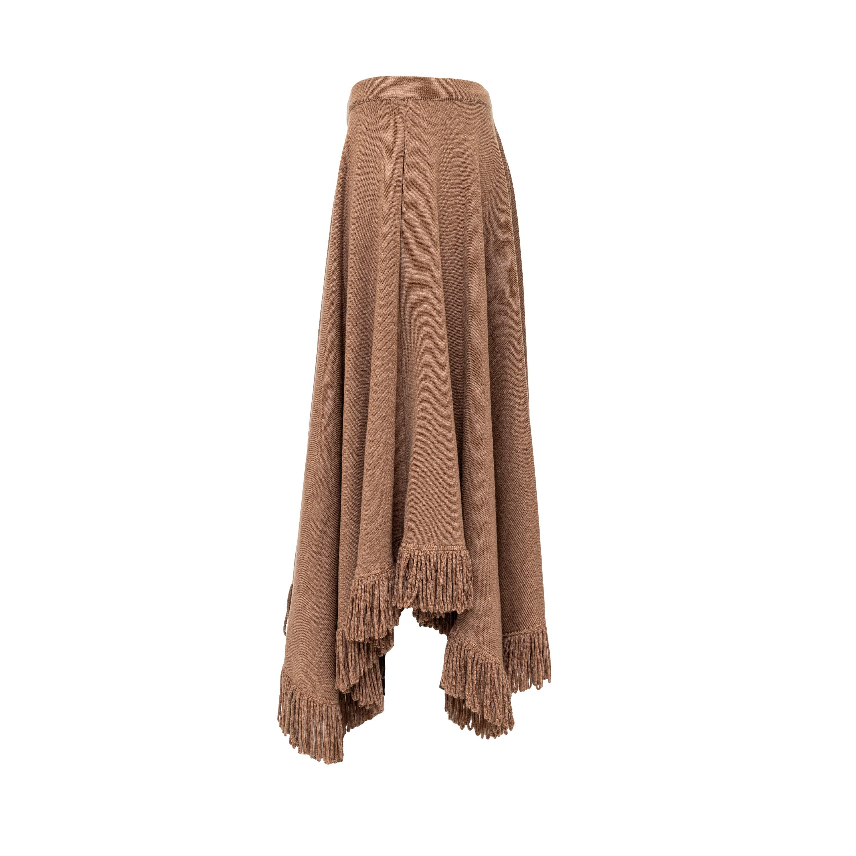 Elevate your wardrobe with the Giorgio Armani Asymmetric Fringed Skirt. Crafted from wool knit fabric, this versatile brown skirt features intricate stitching and an asymmetric drop, complete with stylish fringes. With the added convenience of two