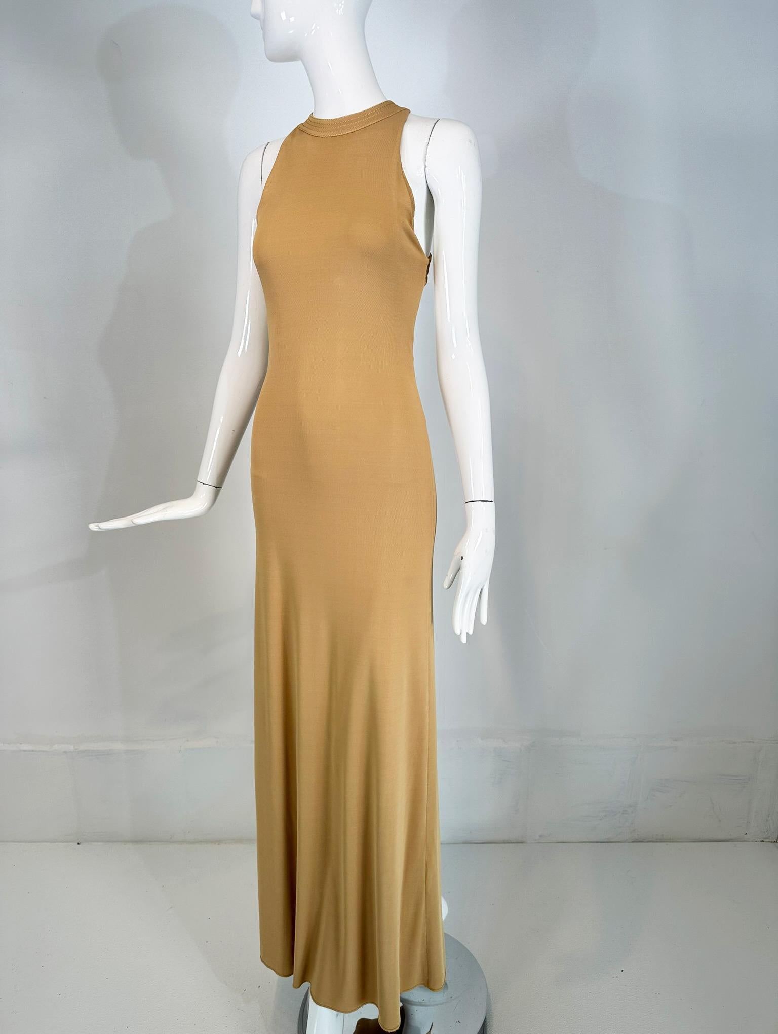 Giorgio Armani Black Jersey Halter Neck Strap Back Evening Dress. From the late 1990s this amazing dress will keep all eyes on you! Graceful & sexy, simple & elegant it doesn't even require jewelry. Fitted dress has a halter neck, it skims the body