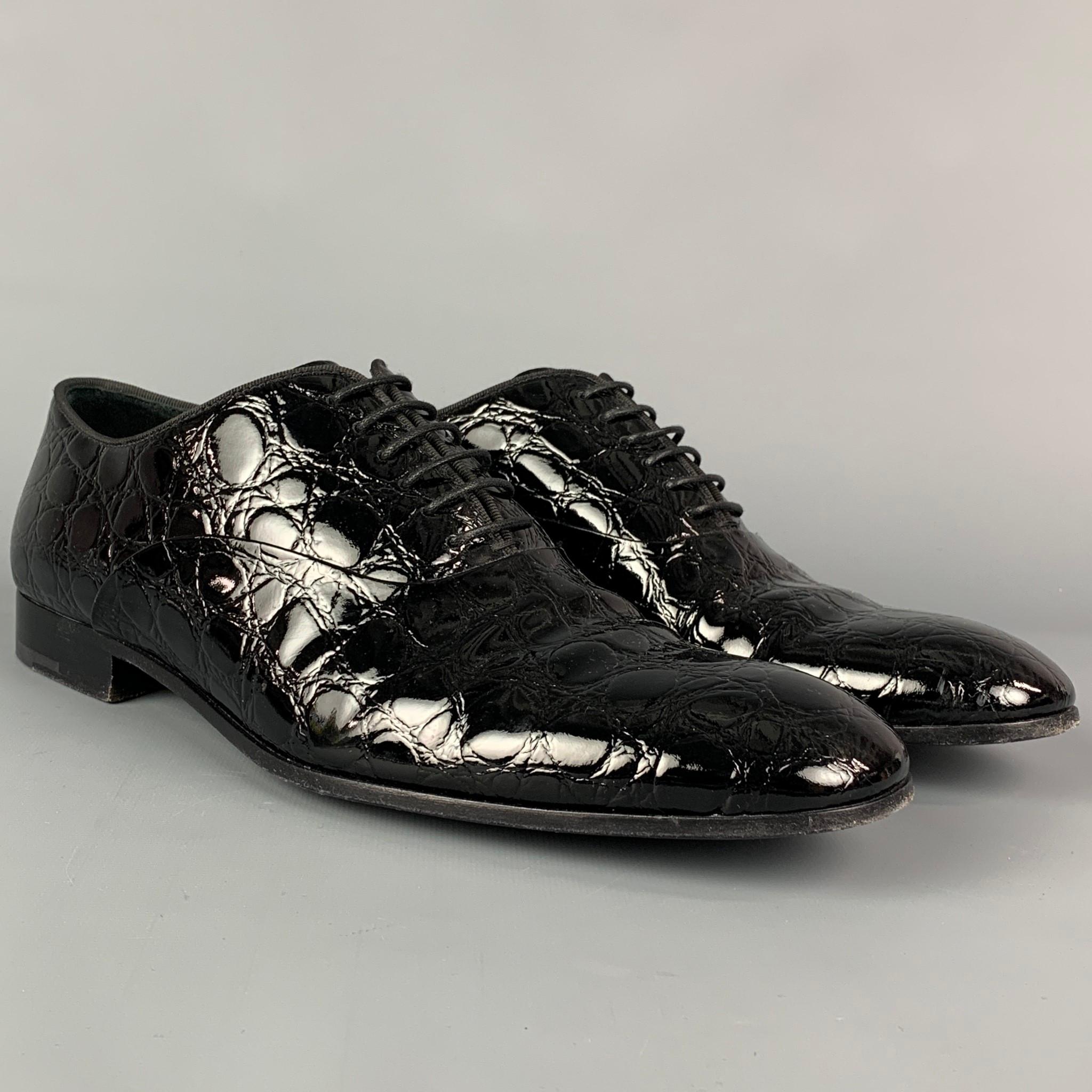 GIORGIO ARMANI shoes comes in a black embossed leather featuring a cap toe, leather sole, and a lace up closure. Made in Italy. 

Very Good Pre-Owned Condition.
Marked: 9 / X2C440

Outsole: 12.25 in. x 4 in. 