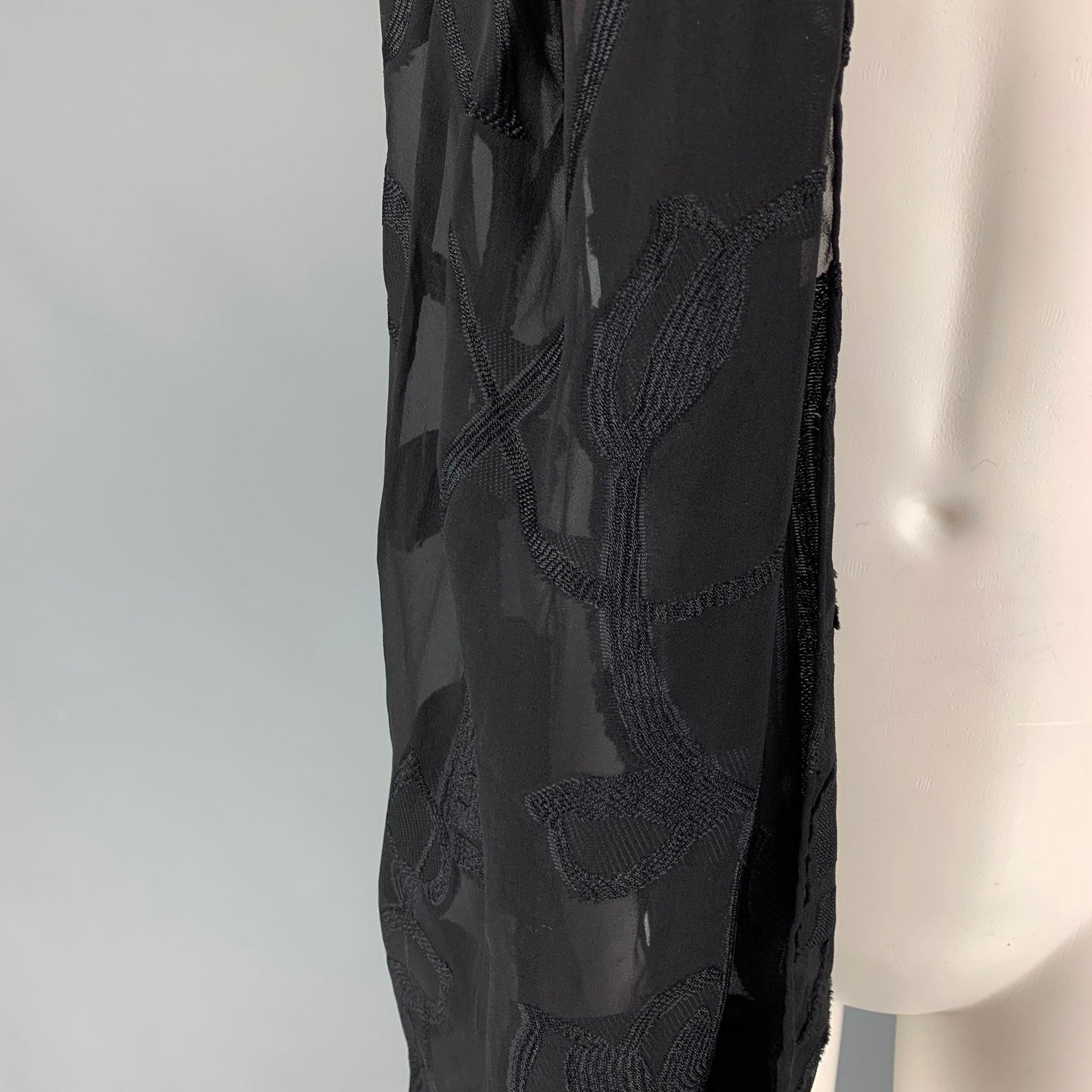 GIORGIO ARMANI scarf comes in a black embroidered rayon blend. Made in Italy.
Very Good
Pre-Owned Condition. 

Measurements: 
  60 inches  x 26.5 inches 
  
  
 
Reference: 119785
Category: Scarves
More Details
    
Brand:  GIORGIO ARMANI
Color: 