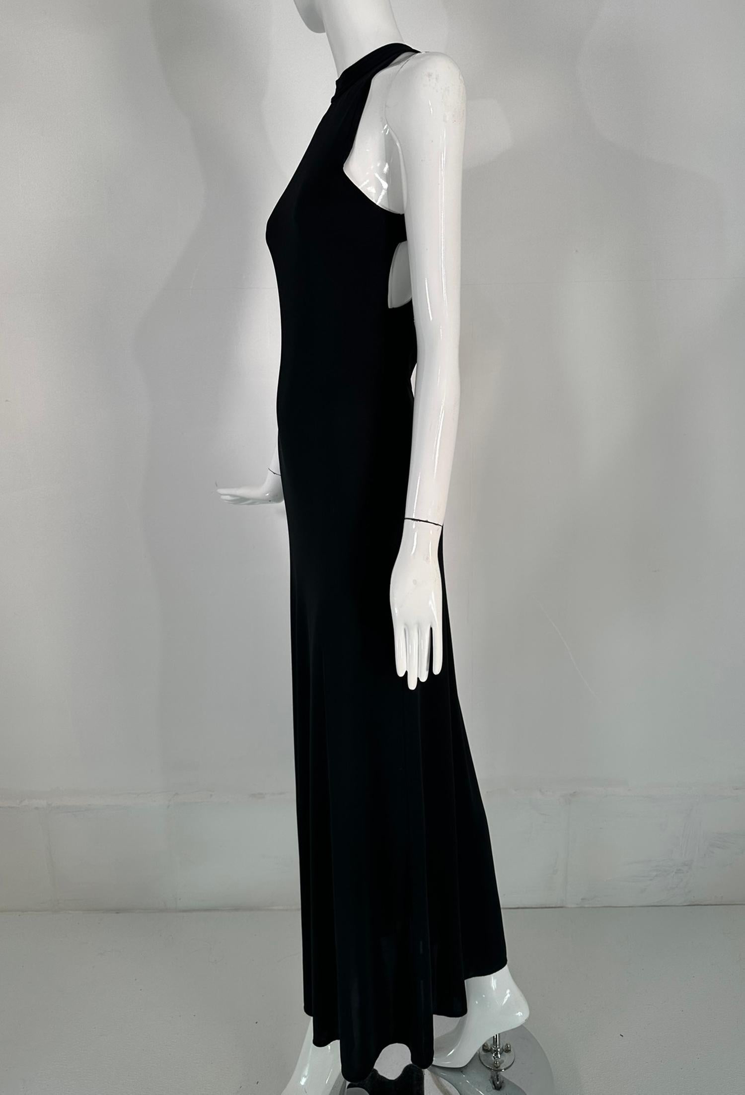 Giorgio Armani Black Jersey Halter Neck Strap Back Evening Dress. From the late 1990s this amazing dress will keep all eyes on you! Graceful & sexy, simple & elegant it doesn't even require jewelry. Fitted dress has a halter neck, it skims the body