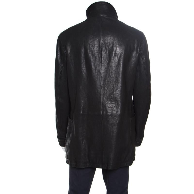 This jacket from Giorgio Armani is sure to make you look suave, smart and very handsome! The black jacket is made of 100% lambskin leather and features a high neck, front button fastenings, twin zip pockets and long sleeves. Pair it with distressed