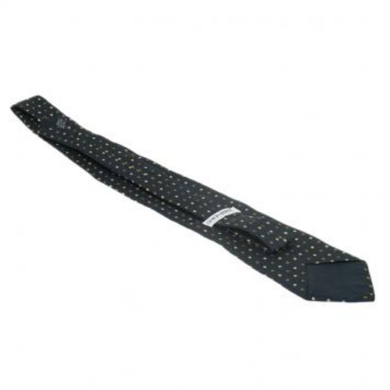 This silk woven tie from Giorgio Armani has a timeless appeal. With its overall polka dotted fabric, this black tie will surely accentuate your charm.