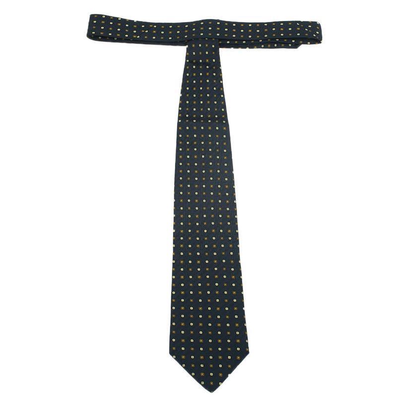 This silk woven tie from Giorgio Armani has a timeless appeal. With its overall polka dotted fabric, this black tie will surely accentuate your charm.

