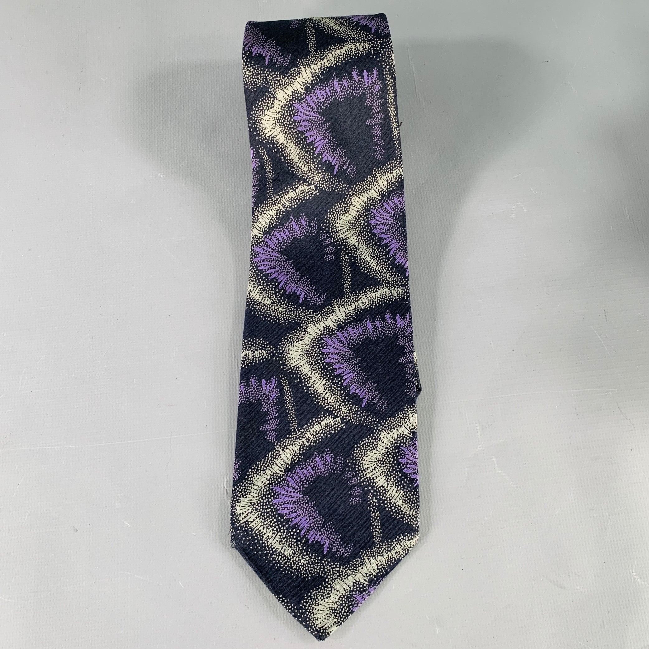 GIORGIO ARMANI necktie
in a black and purple silk featuring an abstract pattern. Made in Italy.Very Good Pre-Owned Condition.
Signs of wear on corner.Width: 3.25 inches Length: 56 inches 
  
  
 
Sui Generis Reference: 136917
Category: Tie
More