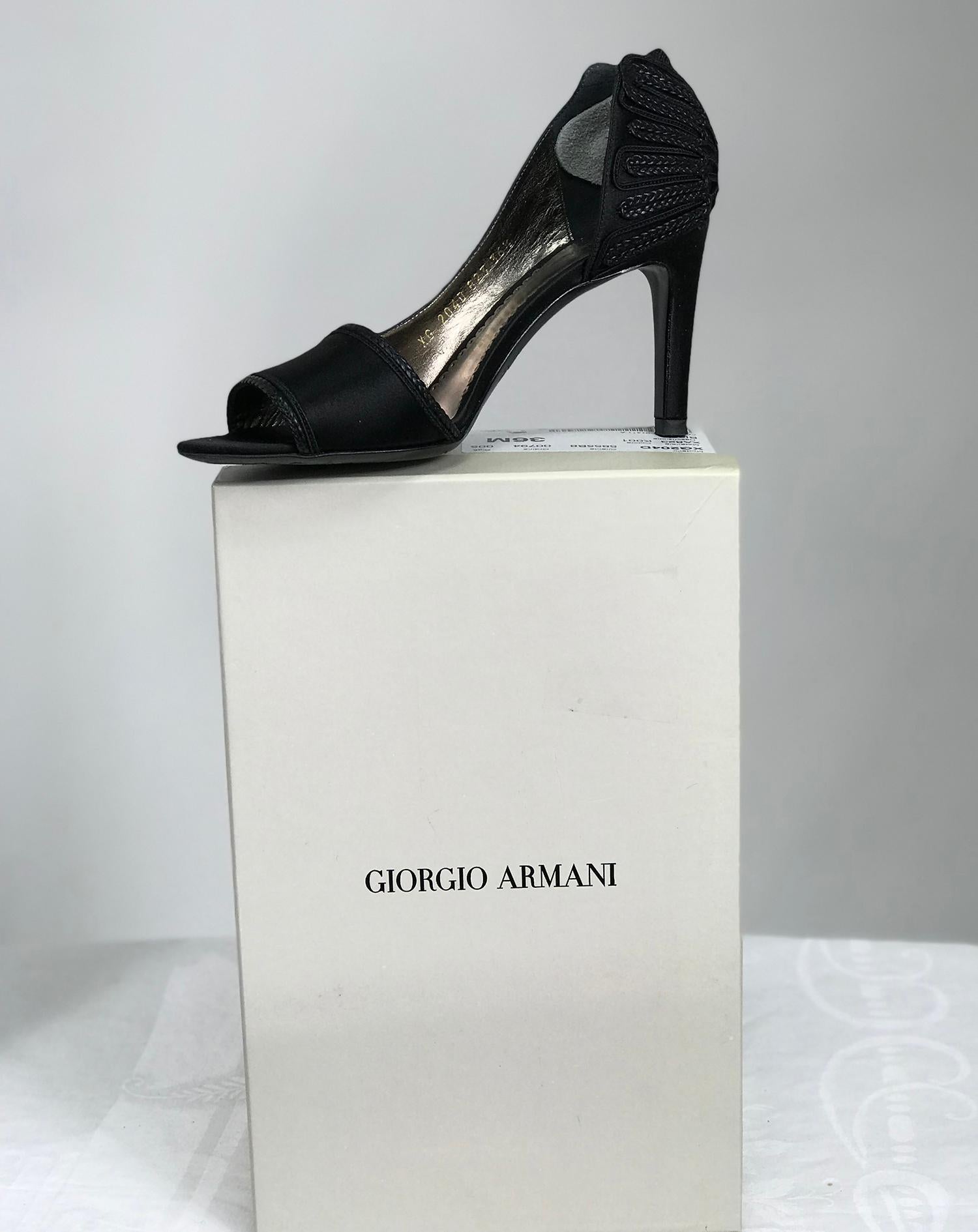 Giorgio Armani black saitn d'orsay high heel pumps with passementerie detail at heel back, 36 M.  3 1/2 inch heels. These beautiful shoes have a narrow braid band trim at the front and the back are appliqued like wings with open work. Black satin,