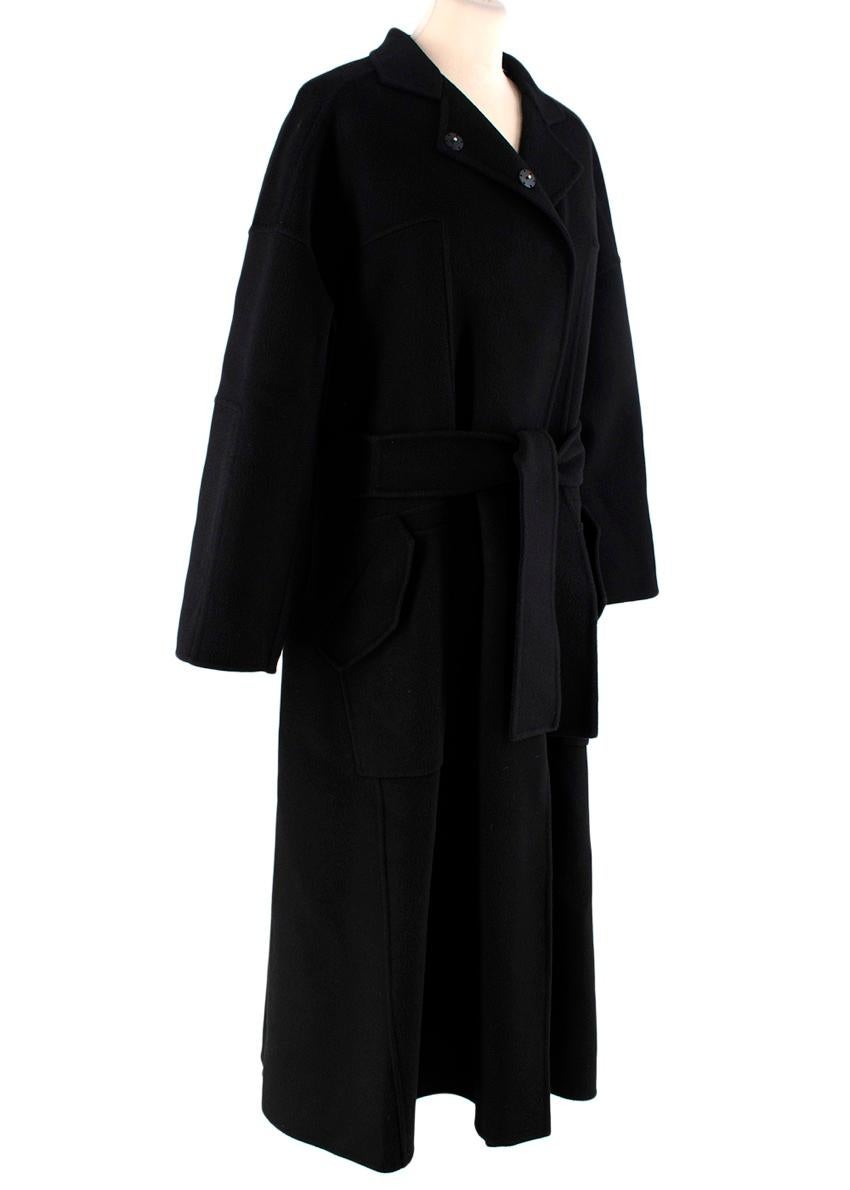 Giorgio Armani Black Seamed Belted Cashmere Coat
 

 -A timeless piece, featuring elegant seamed piping details.
 -Collar 
 -Sumptuous cashmere
 -2 hip flap pockets
 -Concealed button fastening 
 -Belt with one back belt loop
 

 Materials 
 100%
