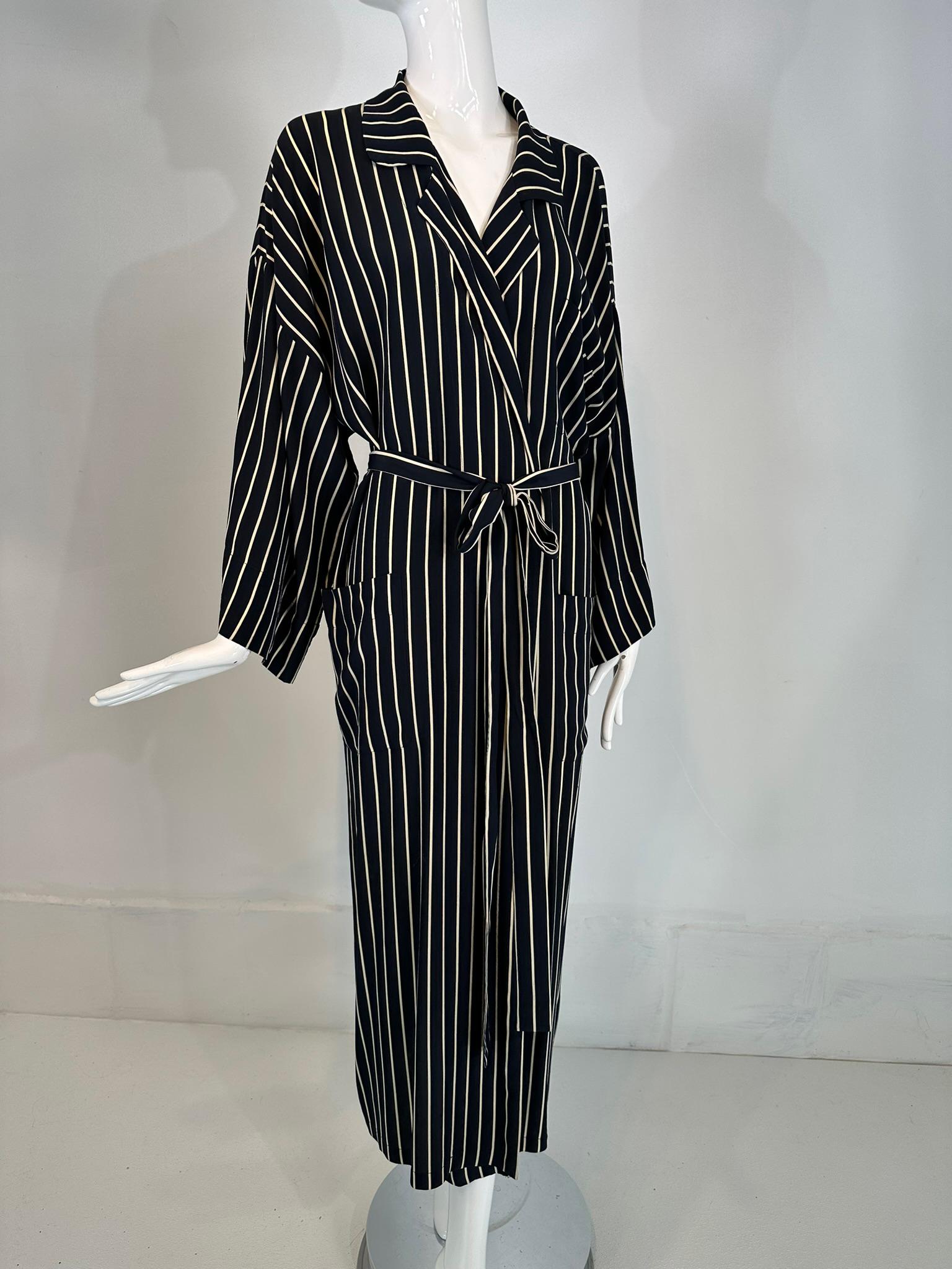 Giorgio Armani black & white stripe silk crepe kimono sleeve, belted robe, marked size small. Notched lapel, 3 patch pockets, chest & 2 hip front. Self belt. French seams. 
Marked size 40/small.
In excellent wearable condition.  All our clothing is