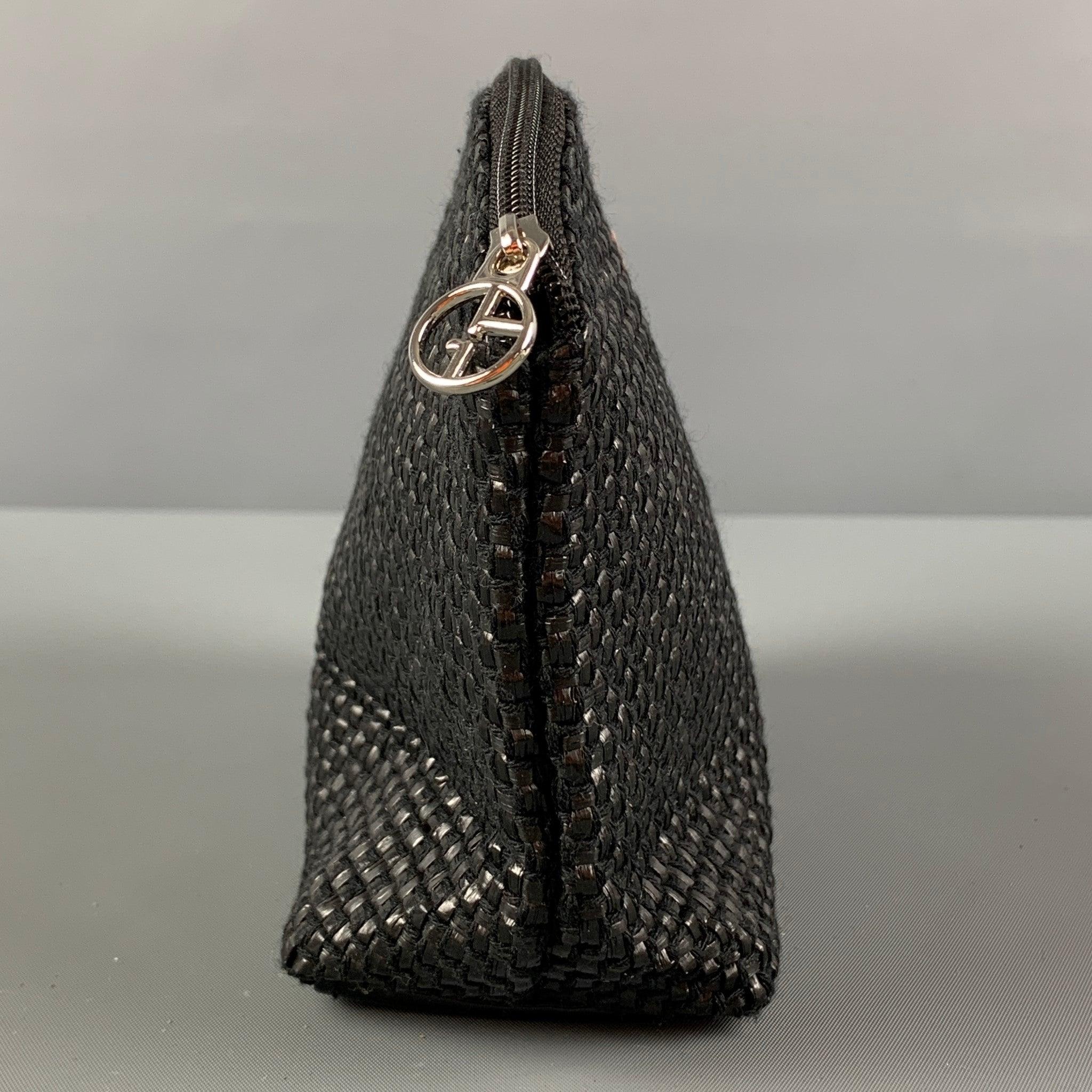 GIORGIO ARMANI make-up bag comes in a black woven patent leather featuring a zipper closure.
Very Good
Pre-Owned Condition. 

Measurements: 
  Length: 6.25 inches  Width:
2.4 inches  Height: 5.5 inches 
  
  
 
Reference: 122554
Category: Handbag &