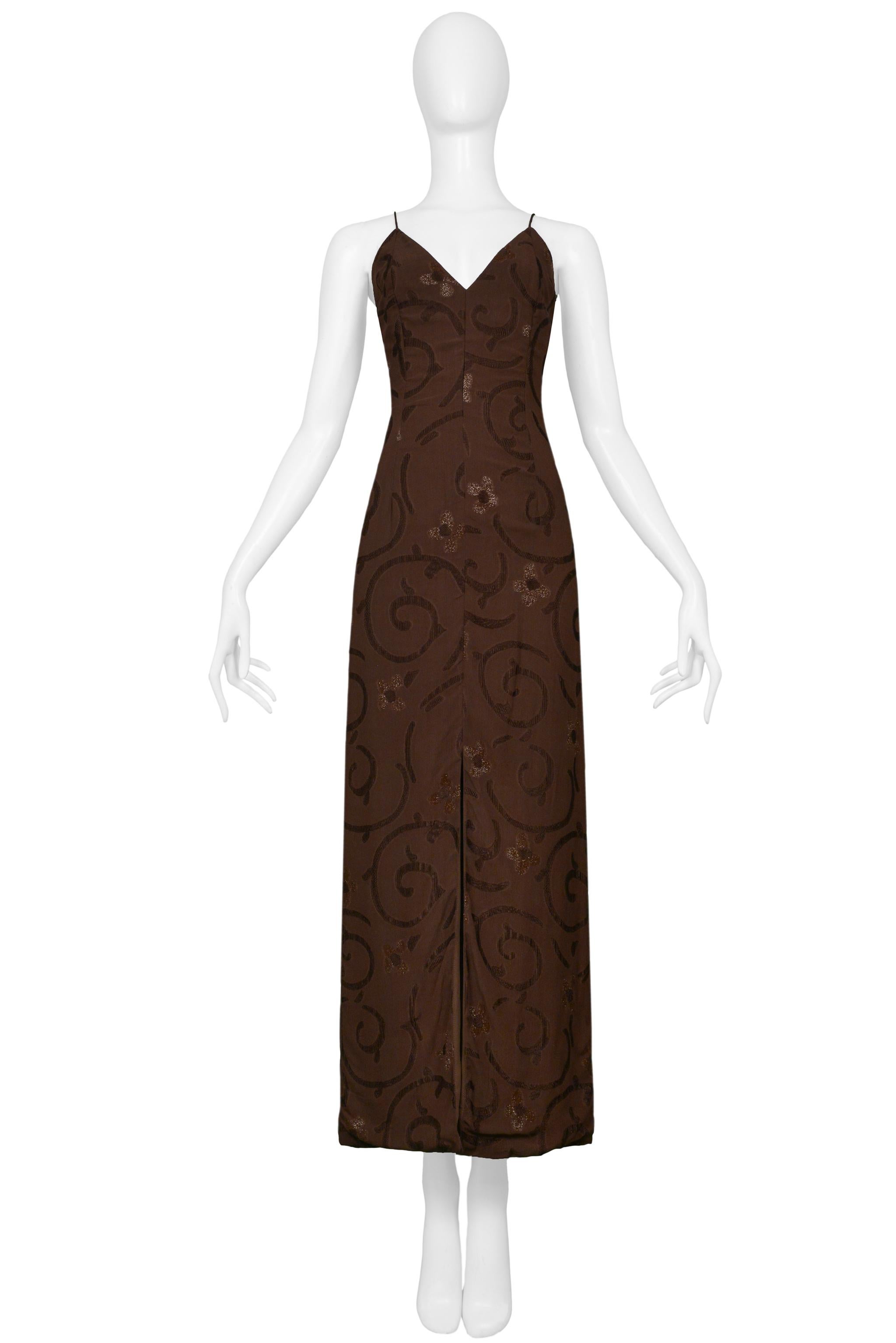 Resurrection Vintage is excited to offer a vintage Giorgio Armani gown featuring spaghetti straps, a high slit in the front, and a swirl floral design.

Giorgio Armani
1997 Collection 
Size: 42
95% Viscose, 5% Polyamide
Excellent Vintage