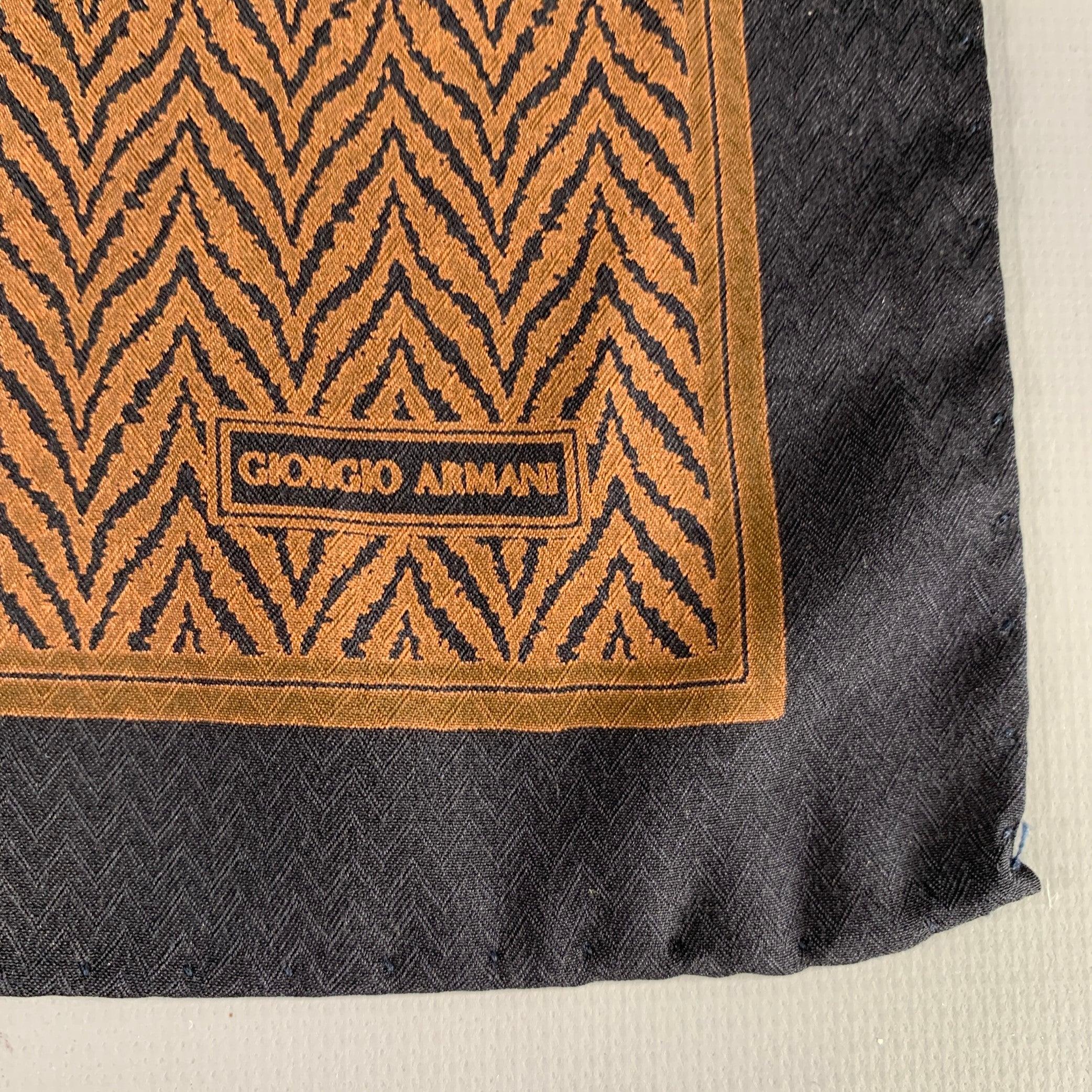 GIORGIO ARMANI pocket square
in a brown and black fabric featuring a zig-zag pattern and picture frame border. Excellent Pre-Owned Condition. 

Measurements: 
  17 inches  x 16.5 inches 
  
  
 
Sui Generis Reference: 133418
Category: Pocket