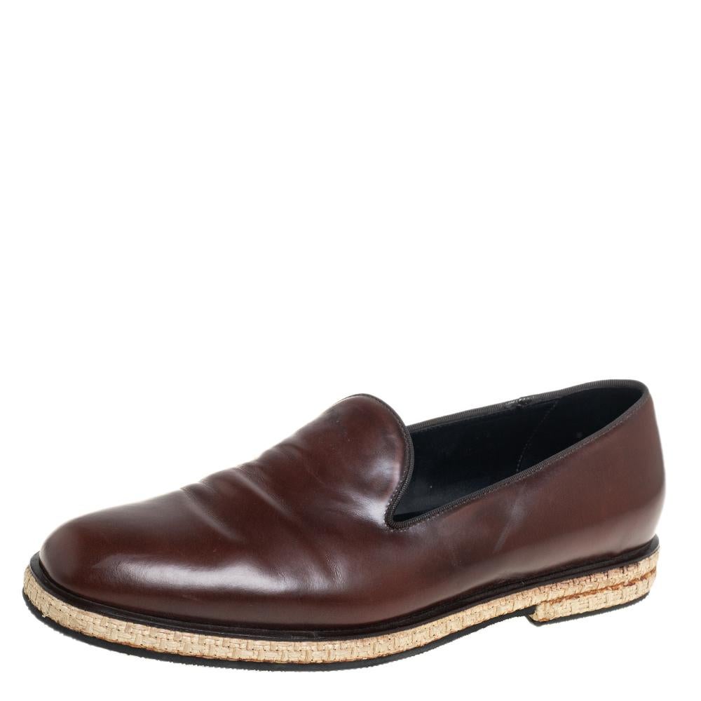 One of the most celebrated fashion houses, the Italian label Giorgio Armani is known for its brilliant craftsmanship in shoemaking. Crafted from leather in a brown shade, these slip-on espadrilles are detailed with jute detailing on the midsoles and