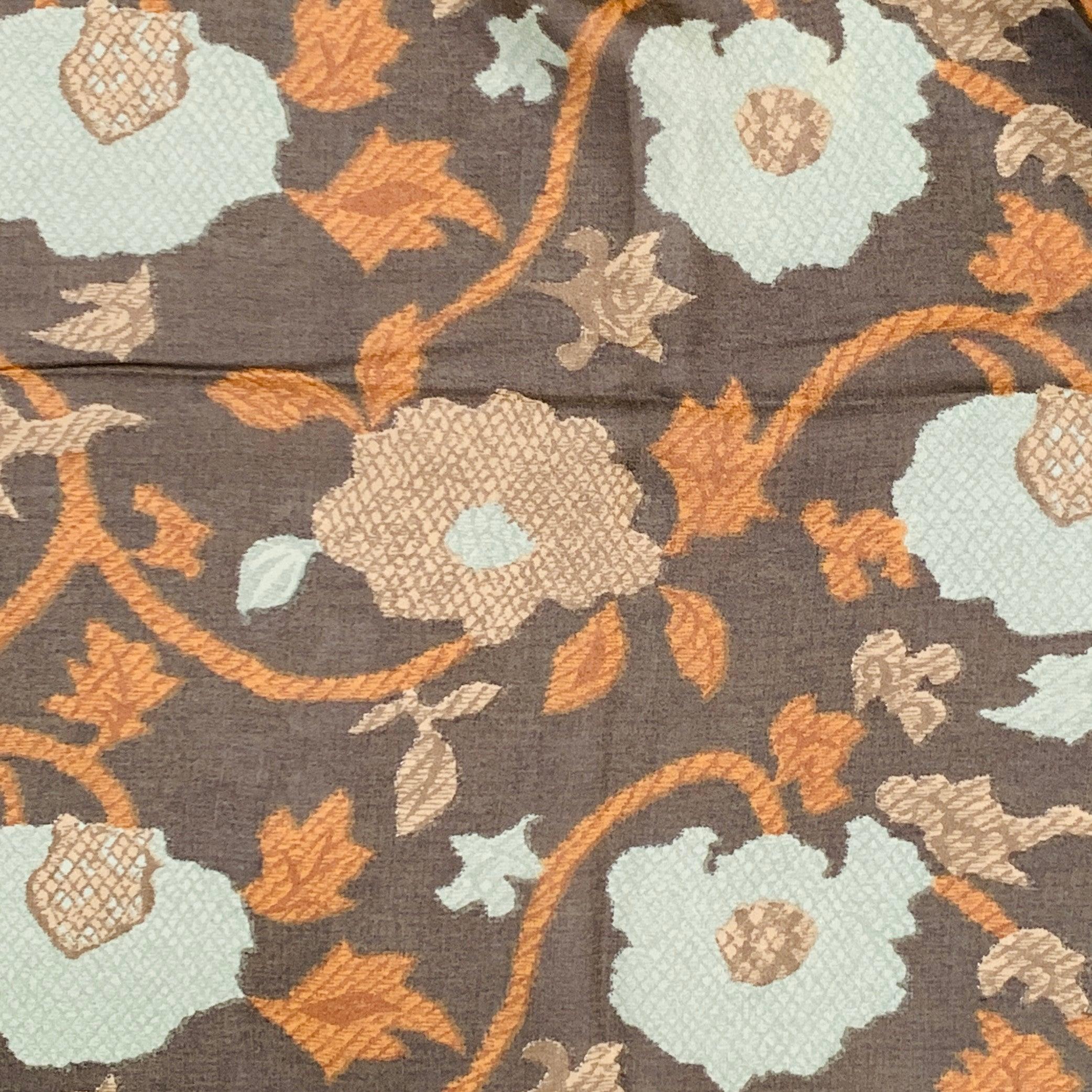 GIORGIO ARMANI scarf shawl
in a brown and turquoise silk featuring an abstract floral print, hand rolled edges, and picture frame border. Comes with case. Made in Italy.Excellent Pre-Owned Condition. 

Measurements: 
  68 x 26 inches 
  
  
 
Sui