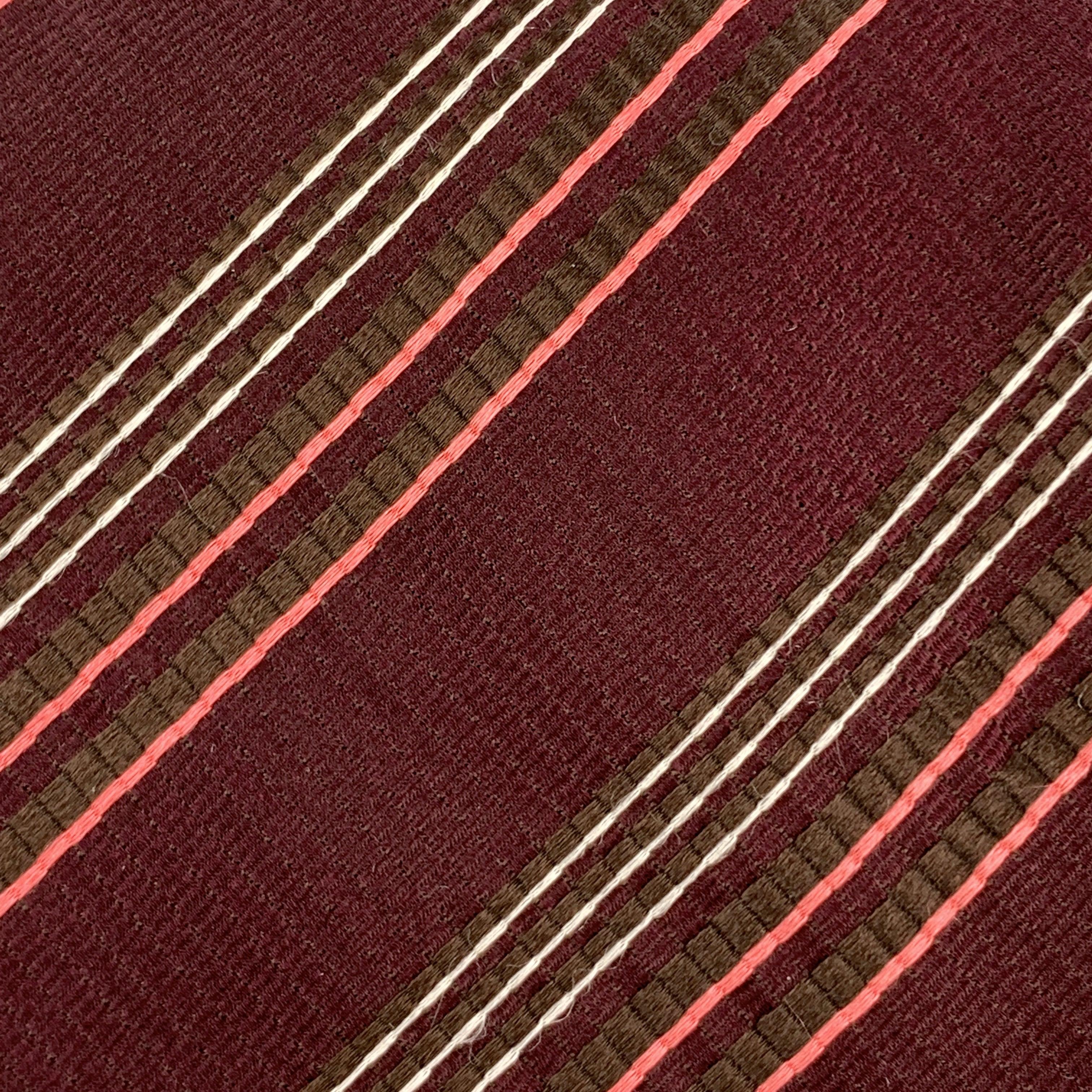 GIORGIO ARMANI
necktie comes in burgundy textured silk with all over diagonal striped print. Made in Italy. Excellent Pre-Owned Condition.Width: 3.75 inches 
  
  
 
Reference: 81141
Category: Tie
More Details
    
Brand:  GIORGIO ARMANI
Color: 
