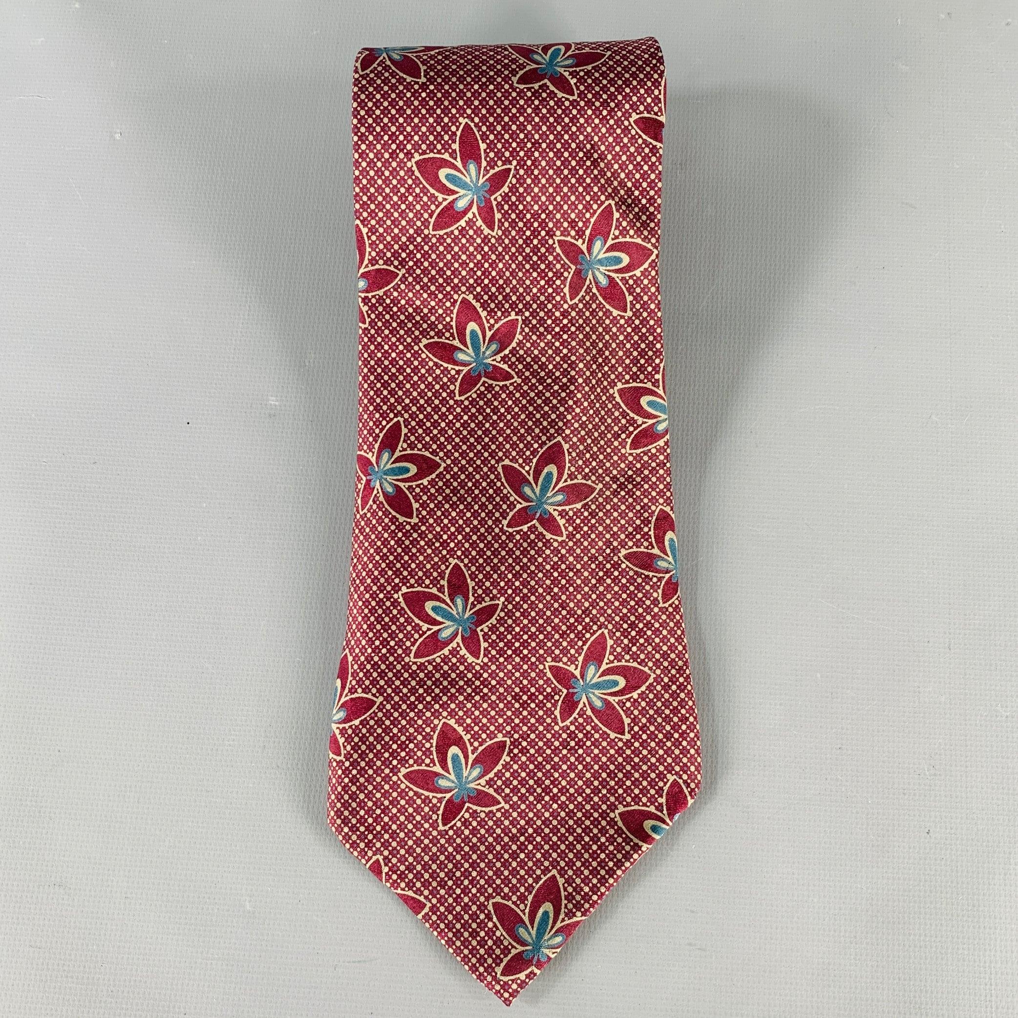 GIORGIO ARMANI necktie
in a burgundy and taupe silk featuring an abstract floral pattern. Made in Italy.Excellent Pre-Owned Condition. 

Measurements: 
  Width: 3.75 inches Length: 57 inches 
  
  
 
Sui Generis Reference: 135442
Category: Tie
More