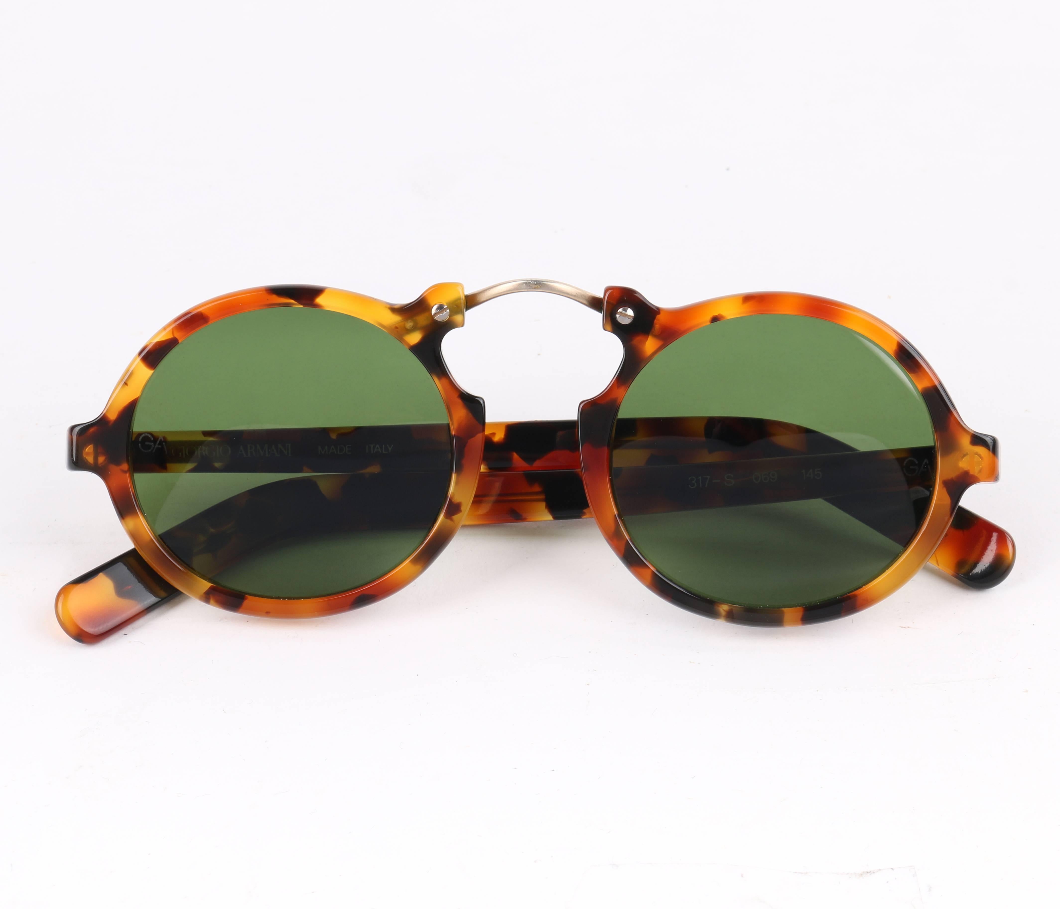 Rare Vintage Giorgio Armani c.1990's round tortoiseshell frame sunglasses. Same style as seen worn by Joel Edgerton in 'The Great Gatsby'. Caramel brown translucent tortoiseshell round plastic frames. Green tinted lenses with 