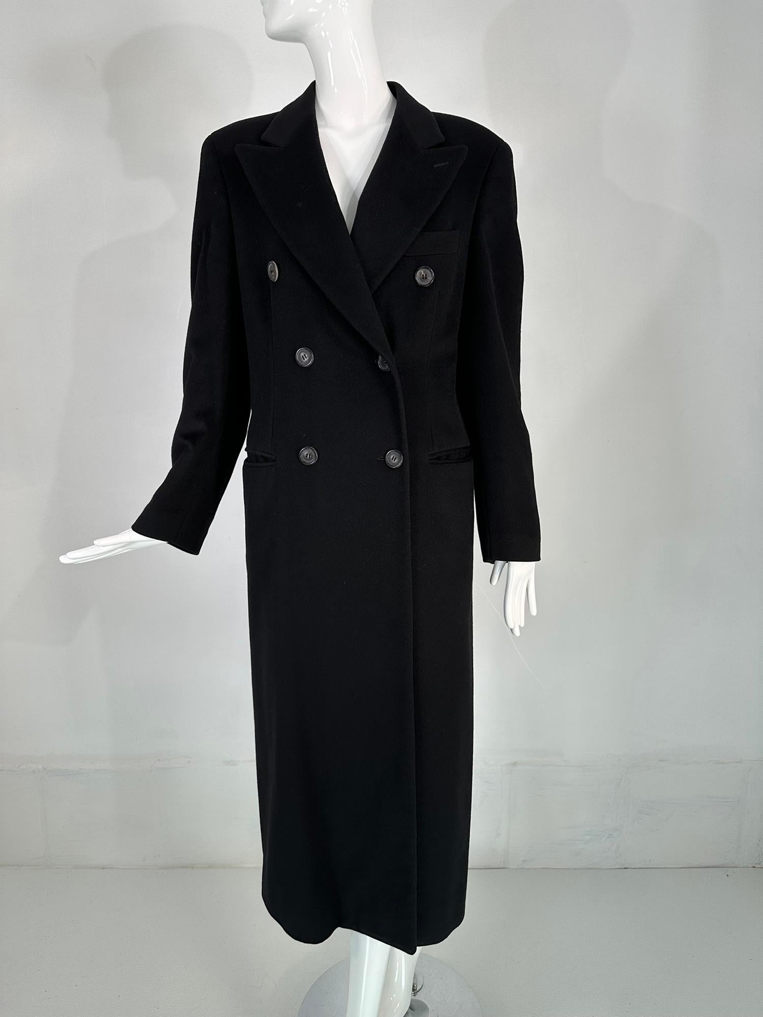 Giorgio Armani classico, black cashmere double breasted winter coat.  Styles come & go, but this beautiful coat will never go out of style, which is why we call it a classic. It will also go anywhere in style, from work to evening events or casual