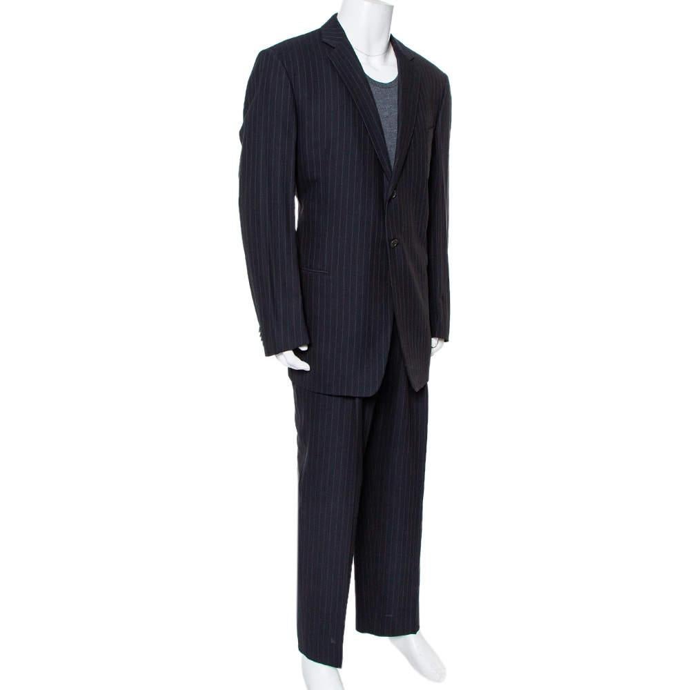 Nail the formal look in a stylish way with this designer suit from Giorgio Armani. Finely tailored from a silk & wool blend, the set carries a pinstriped design. The blazer features notched lapels and front buttons, and the trousers feature a