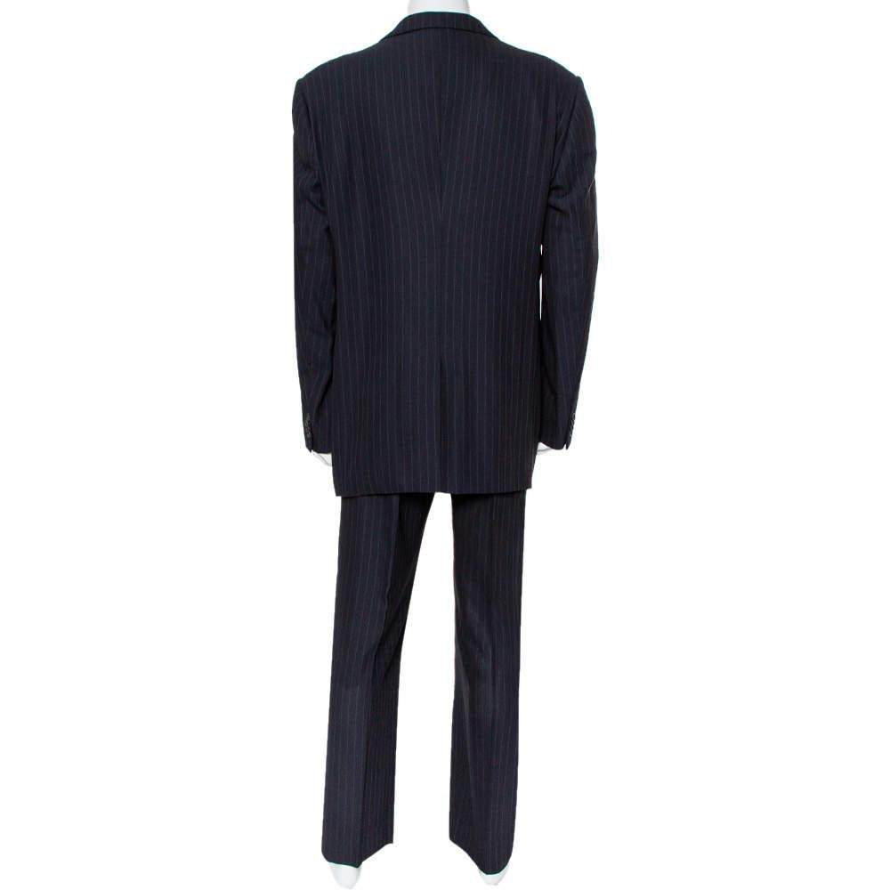 Nail the formal look in a stylish way with this designer suit from Giorgio Armani. Finely tailored from a silk & wool blend, the set carries a pinstriped design. The blazer features notched lapels and front buttons, and the trousers feature a
